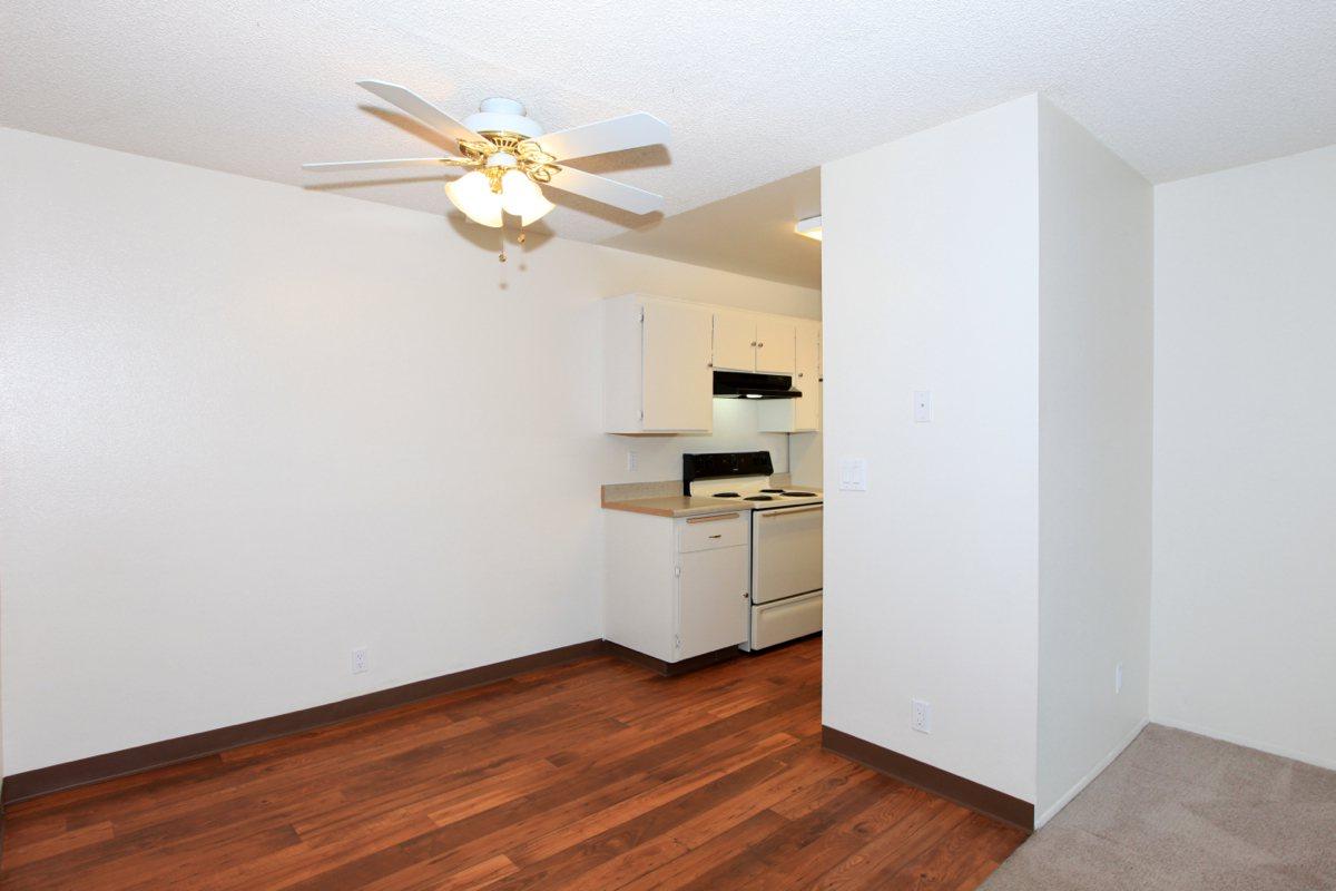 a kitchen with a wood floor