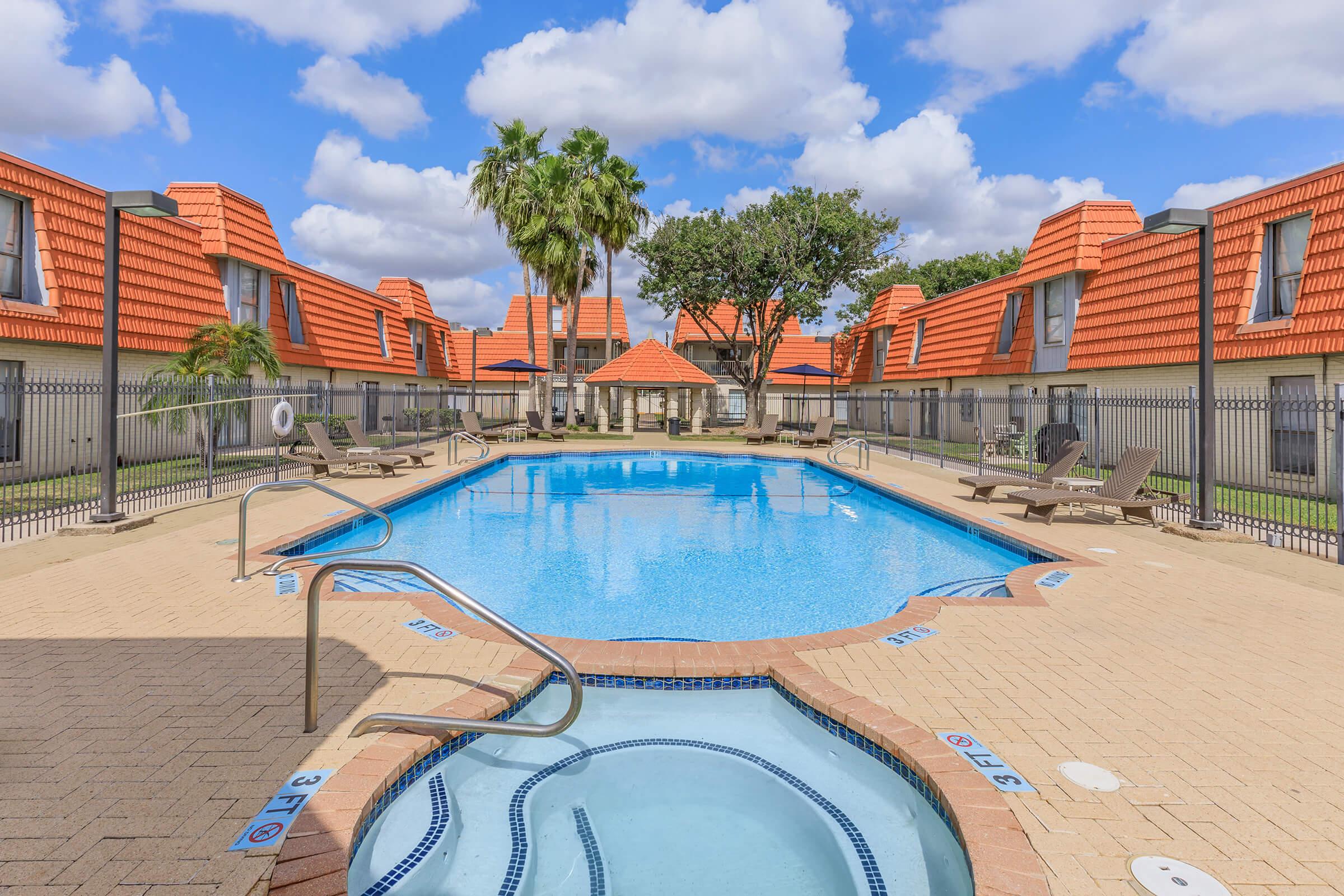 a sandy beach next to the building