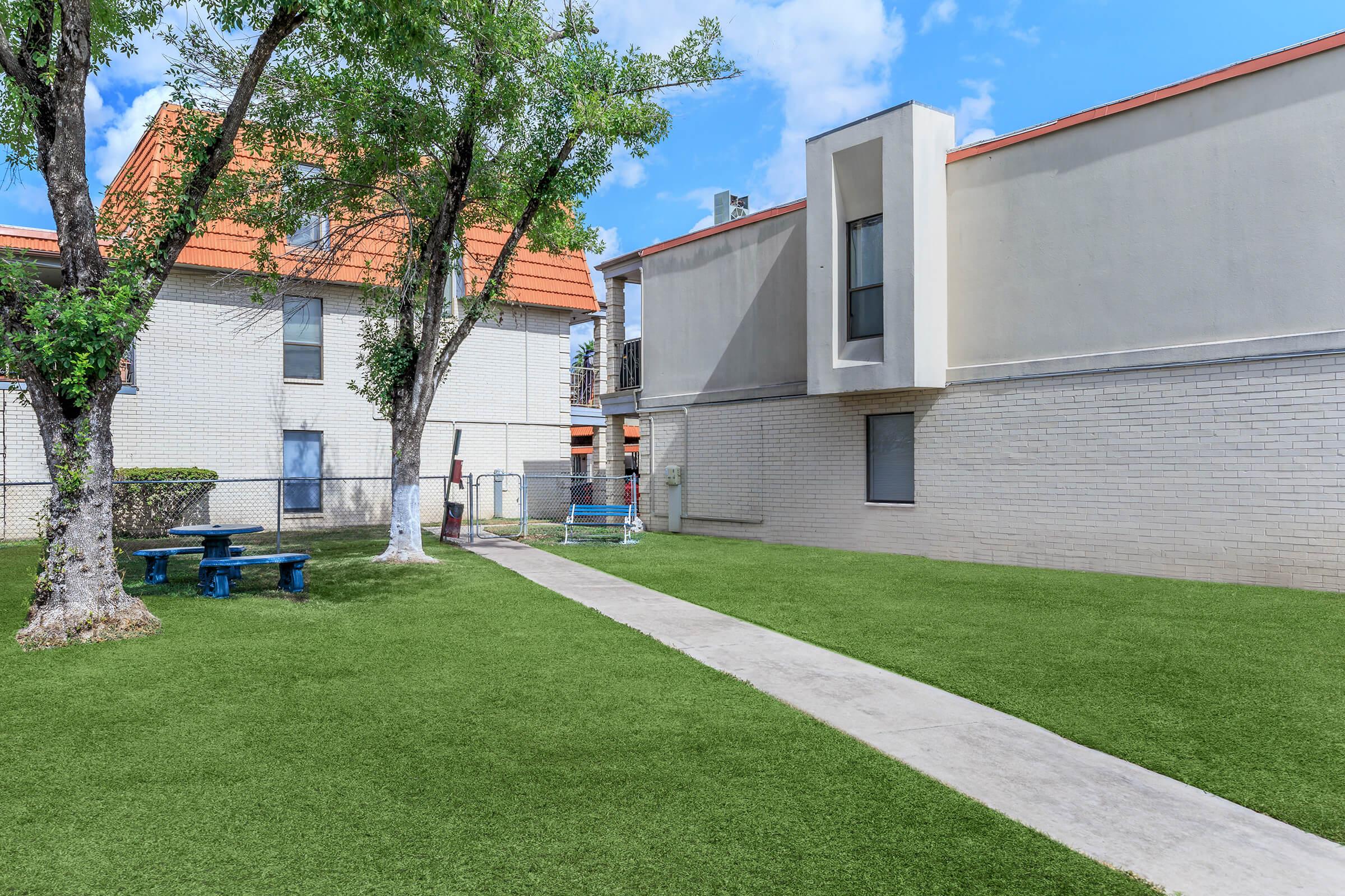 a large lawn in front of a house