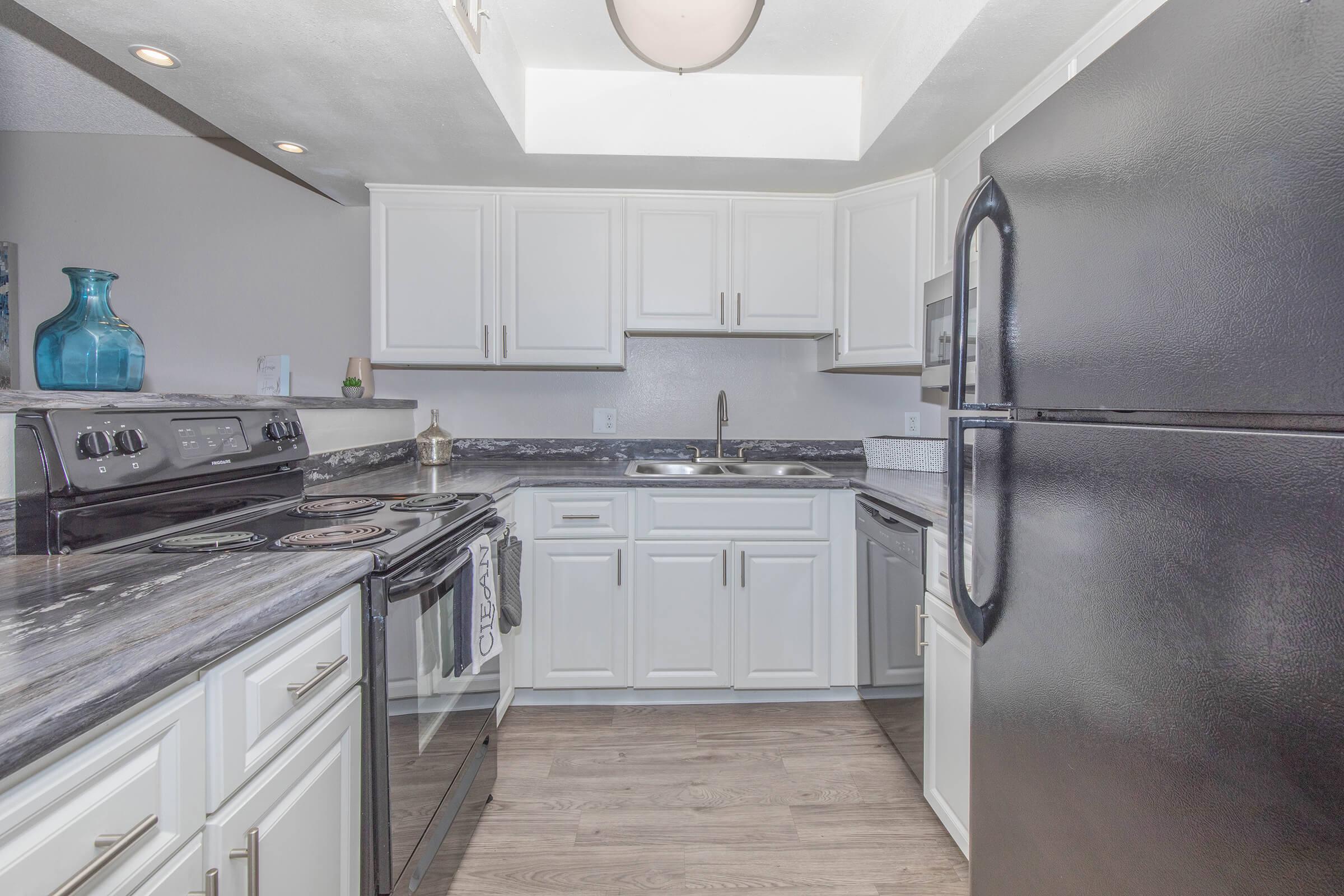 a stainless steel refrigerator in a kitchen