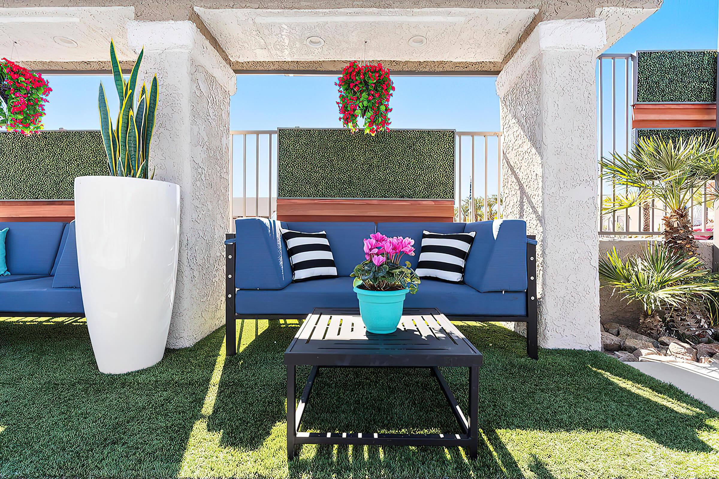 a couple of lawn chairs sitting on top of a table