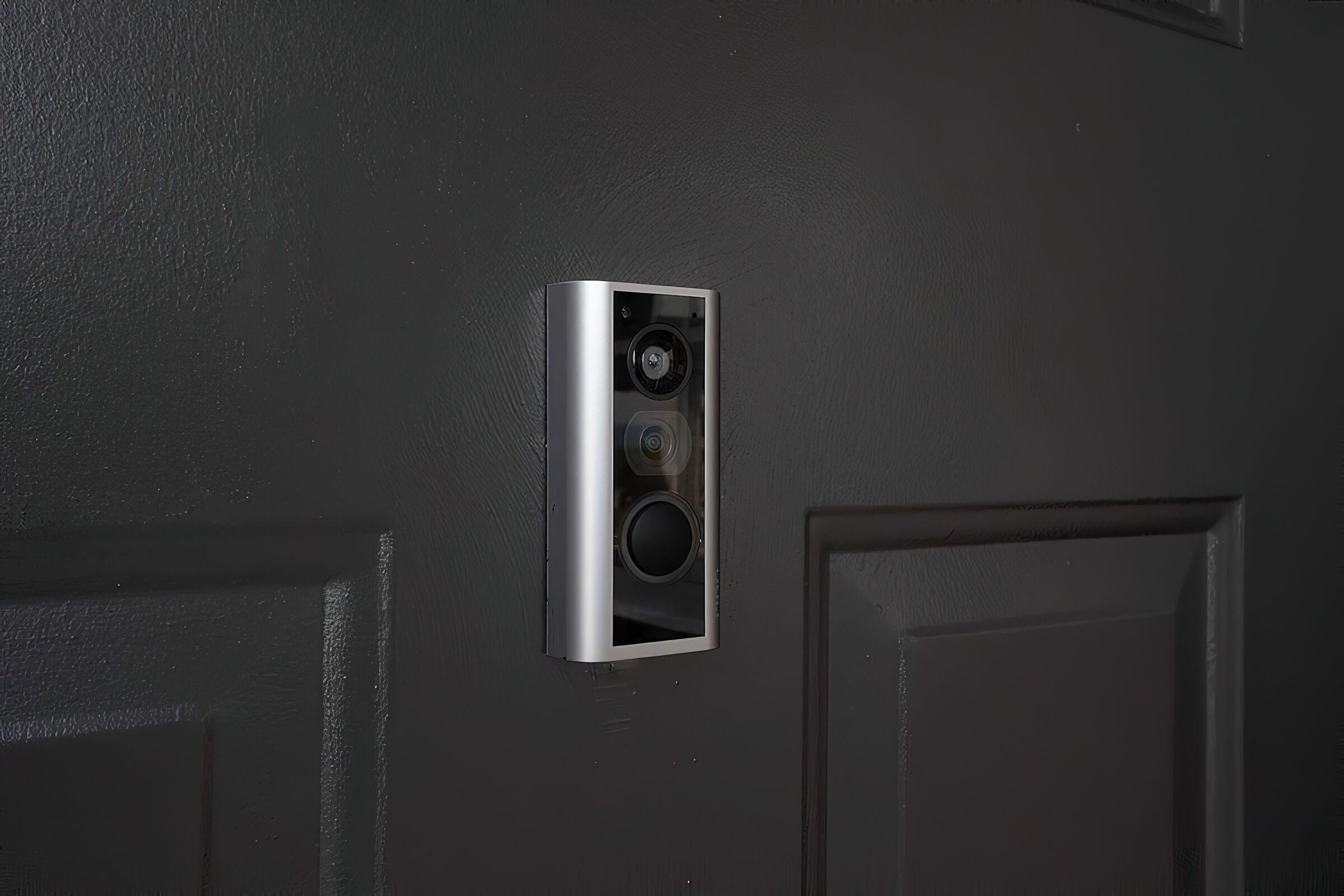 a speaker next to a door