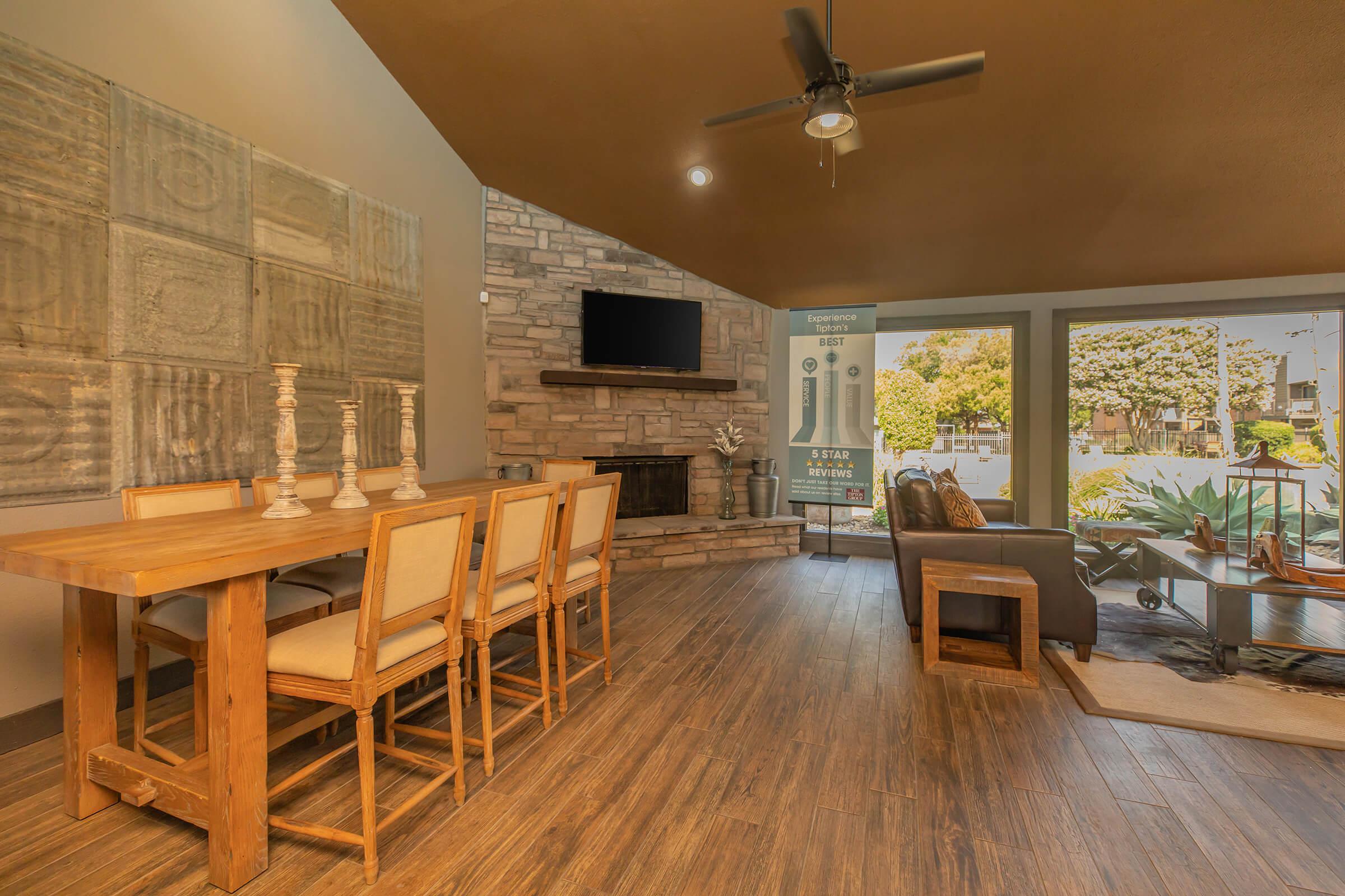 Ladera Ranch community room with a wooden table and chairs