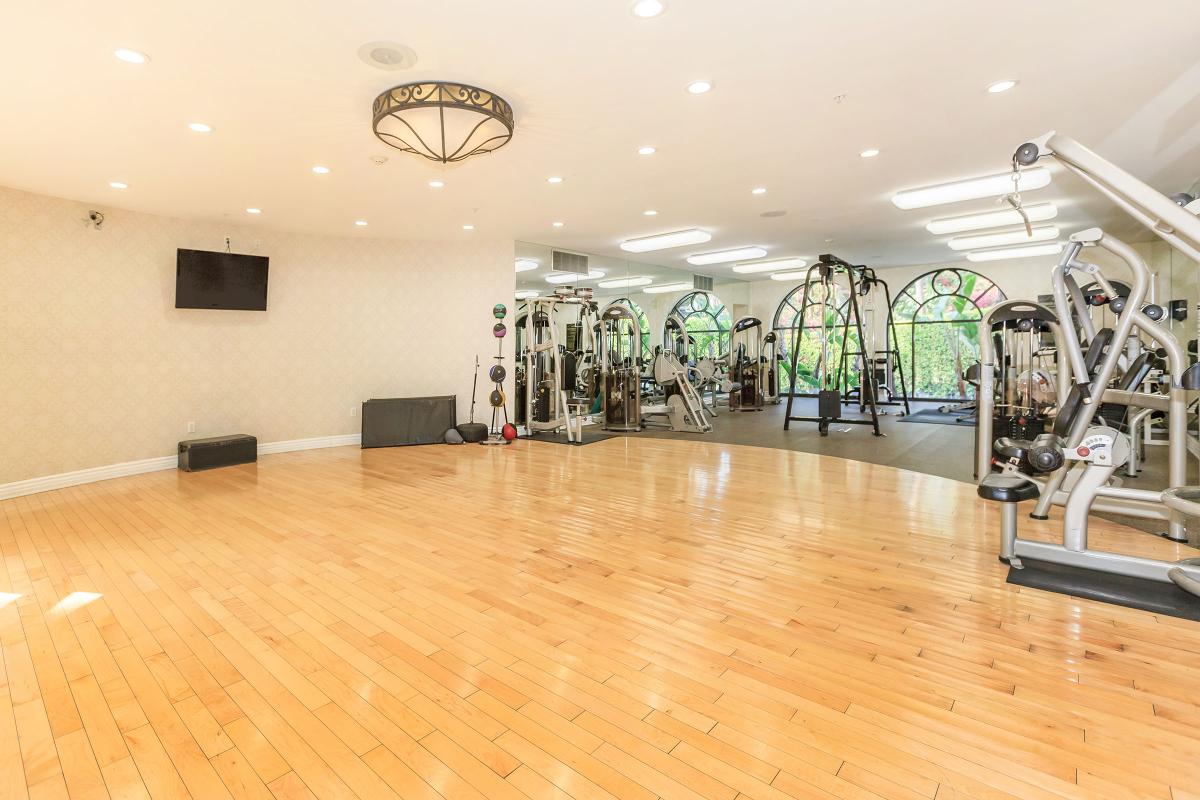 The Orsini community gym with wooden floors