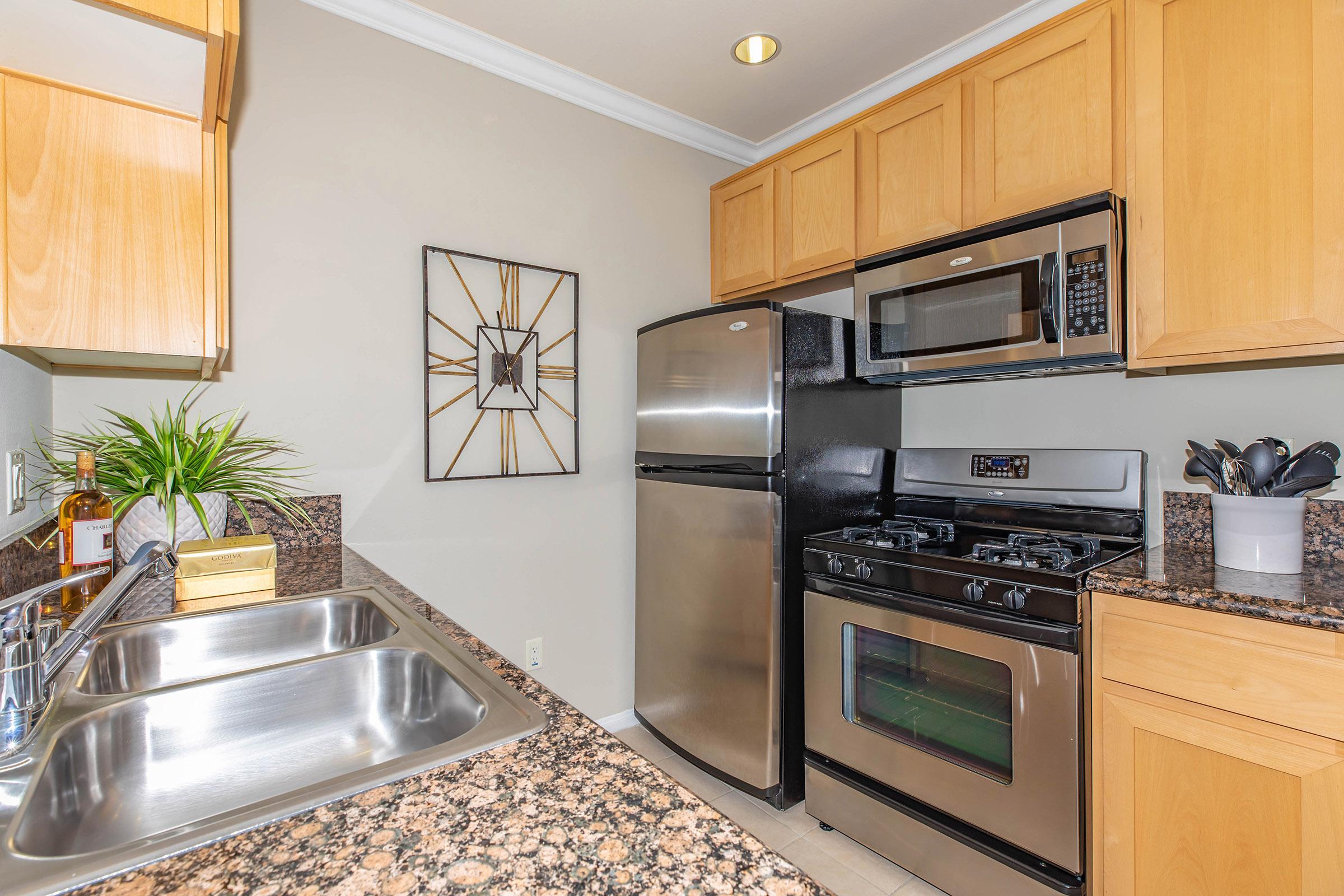 a kitchen with stainless steel appliances