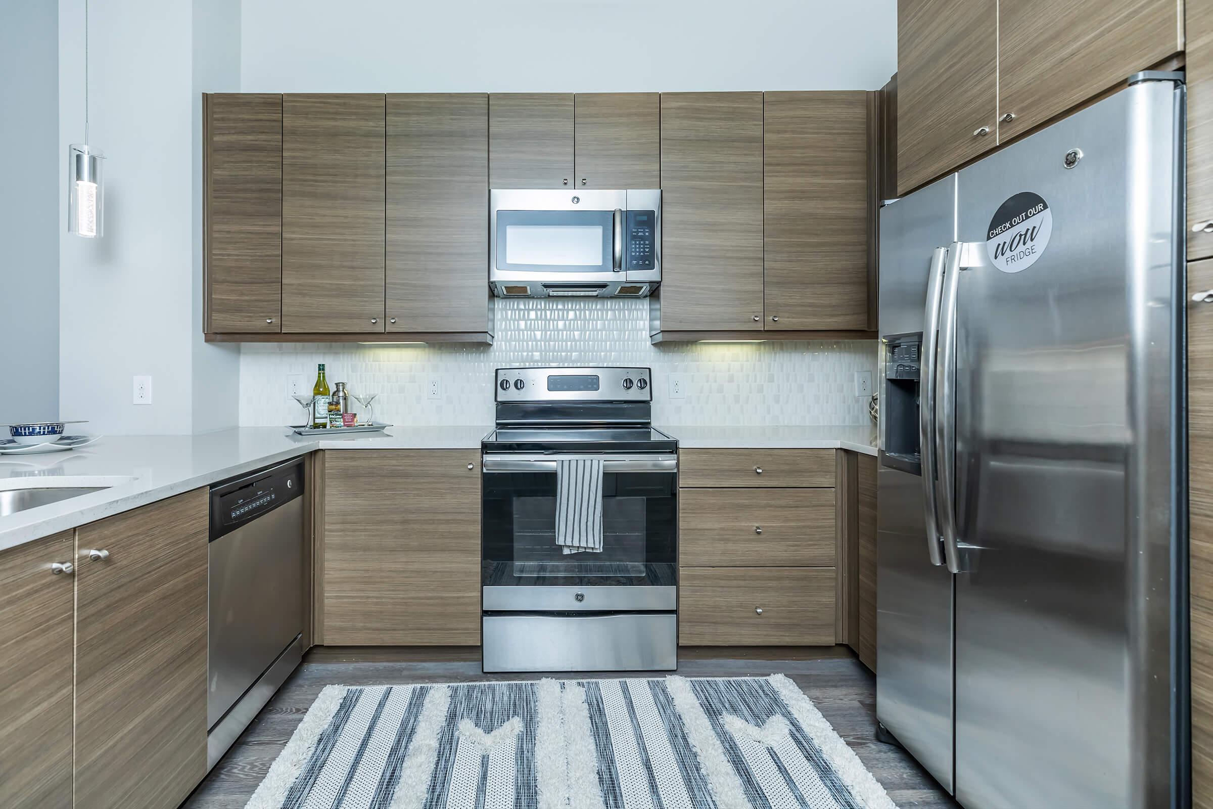 a modern kitchen with stainless steel appliances