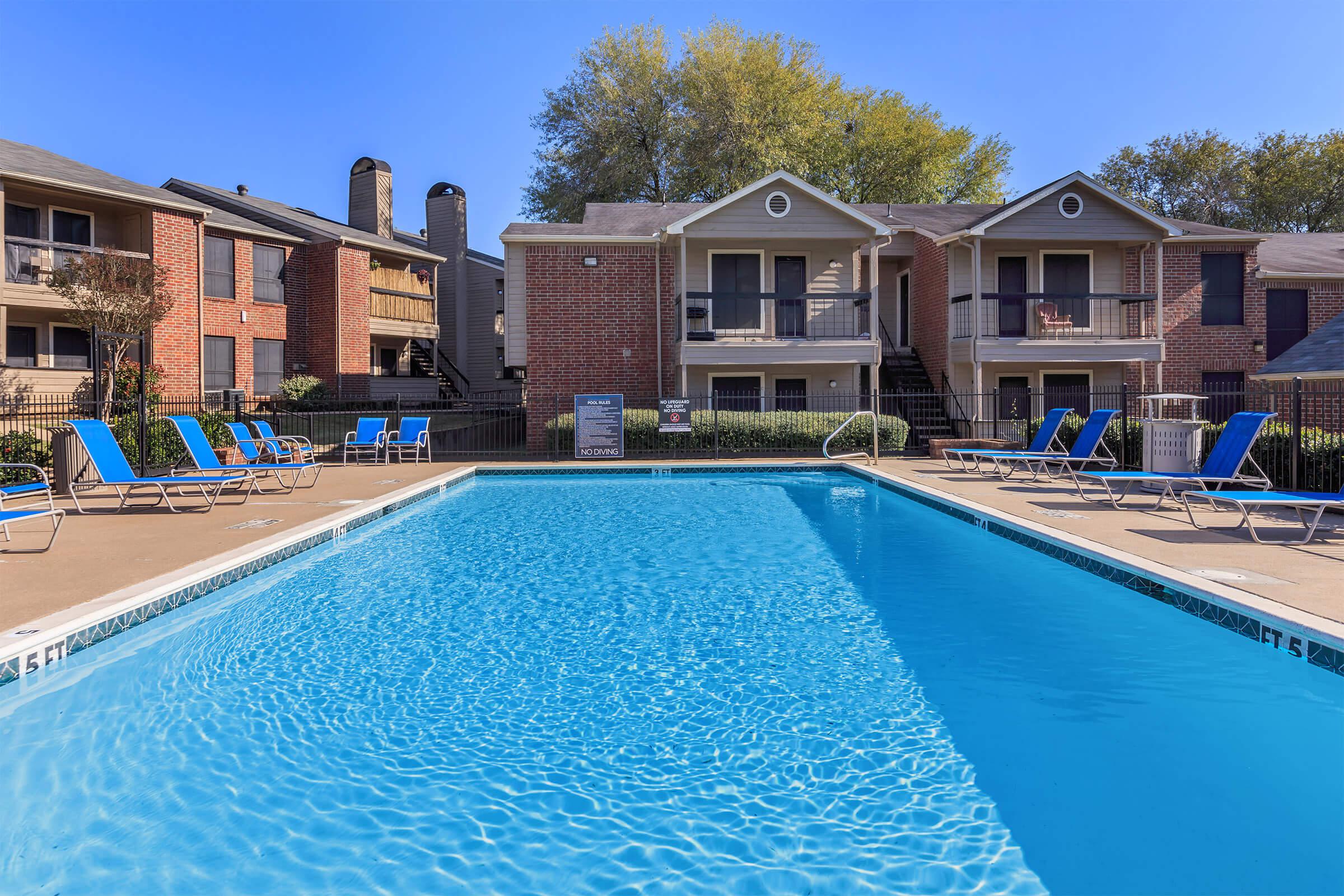 a house with a large pool of water