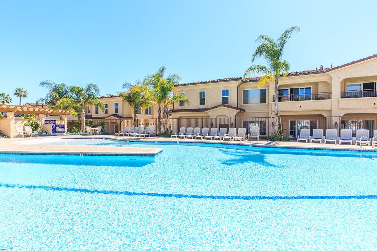 a large pool of water in front of a building