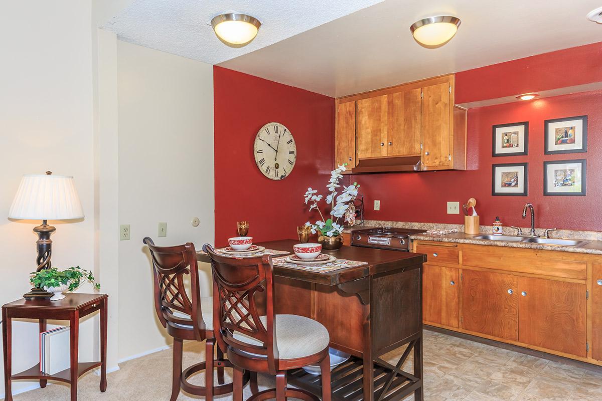 a kitchen with a dining room table