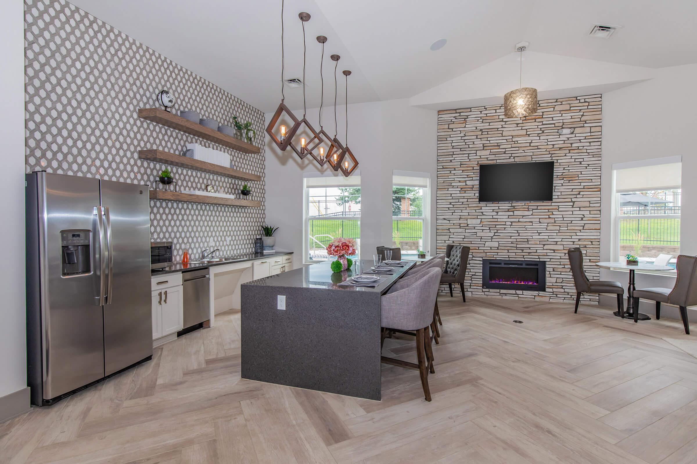 a living room filled with furniture and a stove