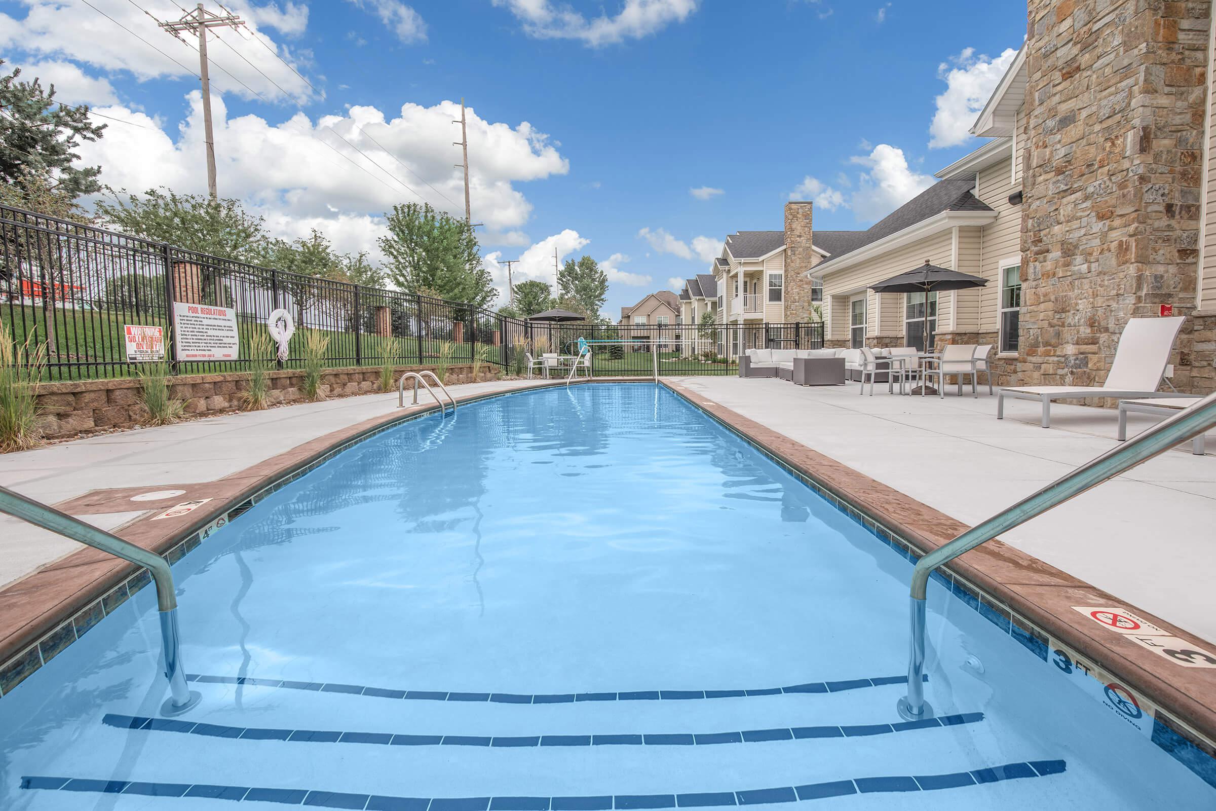 a pool next to a building