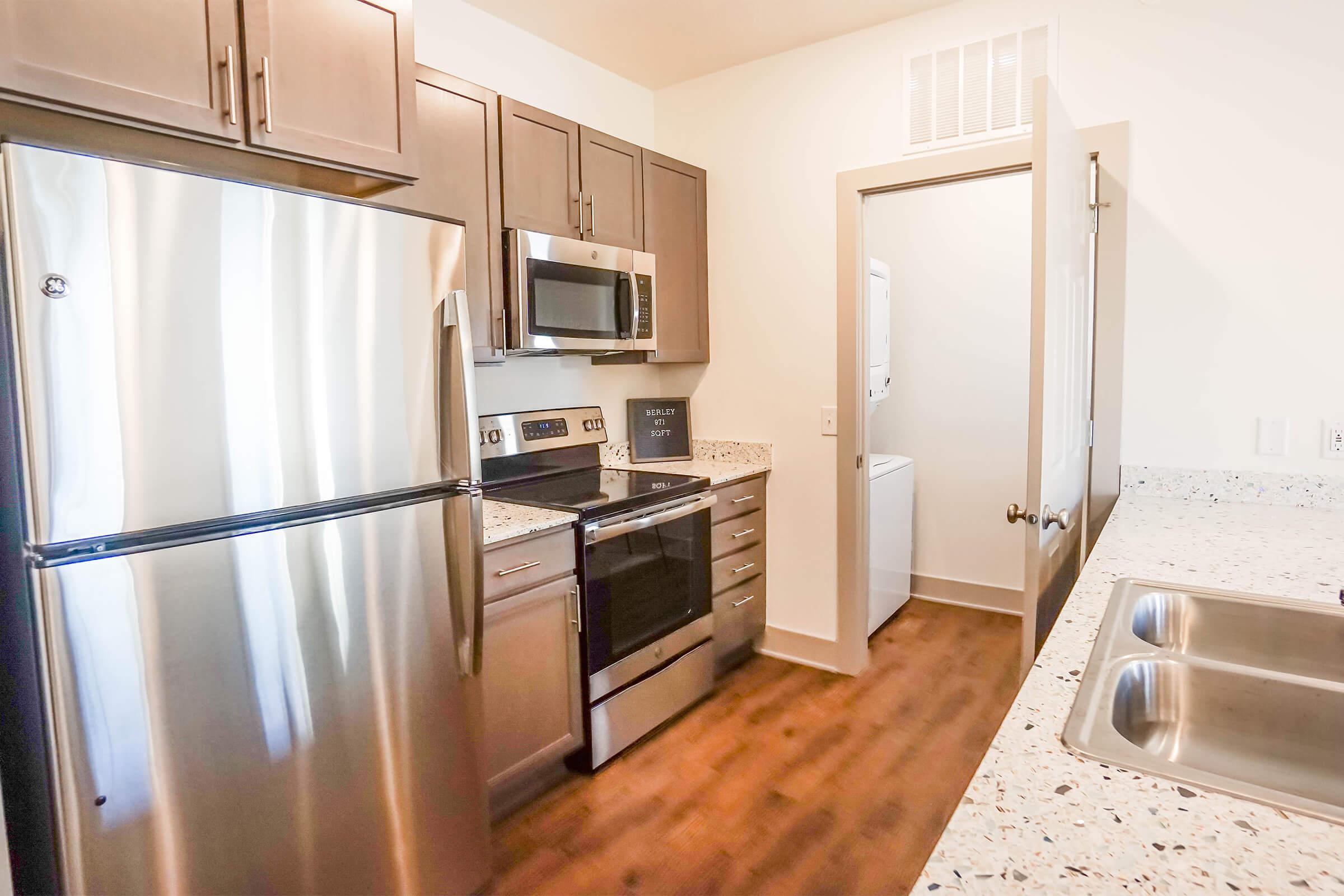 a stainless steel refrigerator in a kitchen