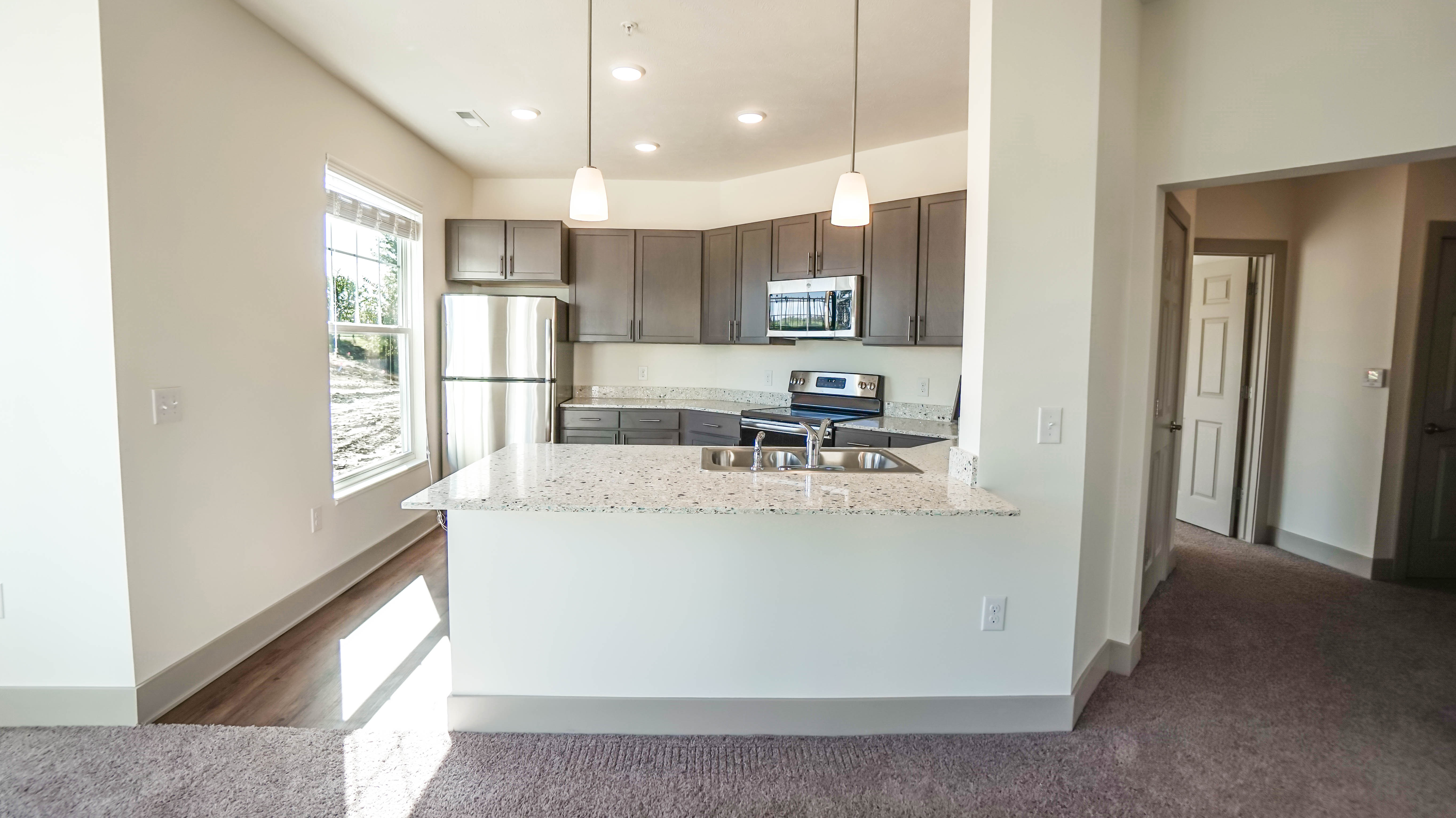 a large white refrigerator in a kitchen