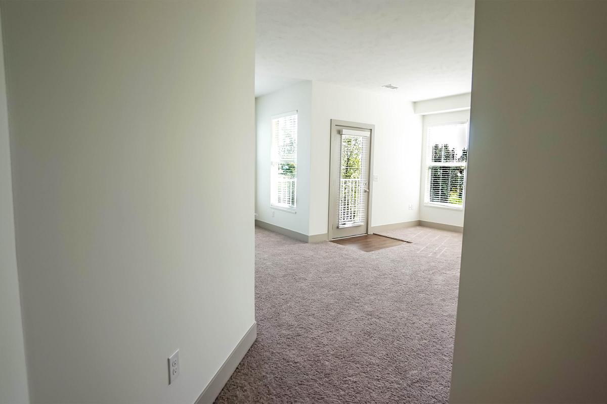 a white refrigerator freezer sitting in a room