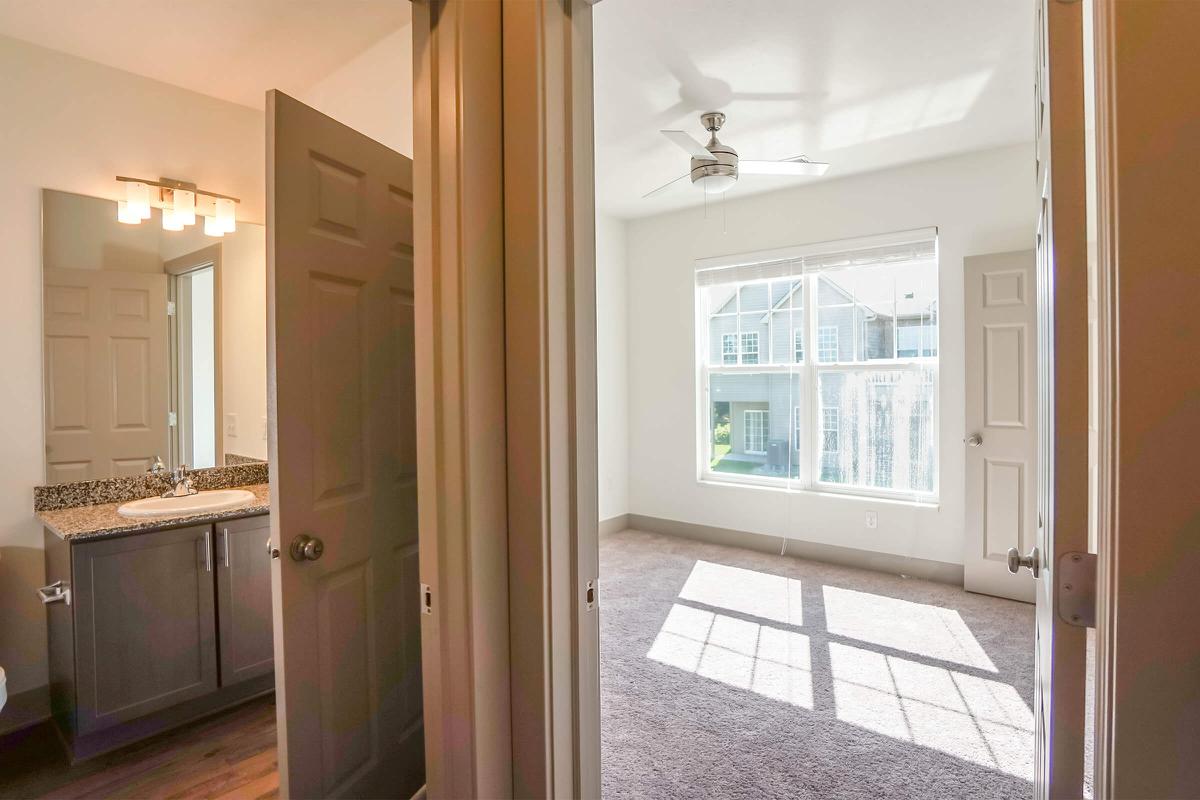 a kitchen with a sink and a window