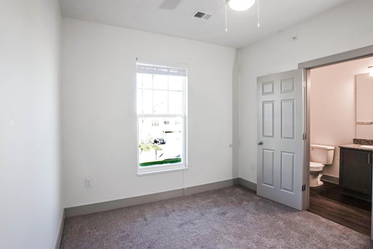 a room with a sink and a window