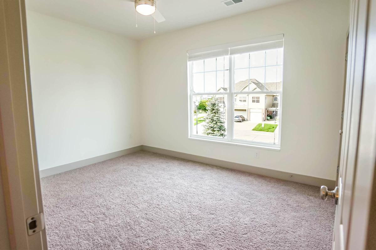 a view of a tiled floor next to a window