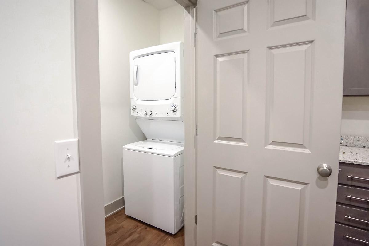 a white refrigerator freezer sitting in a room