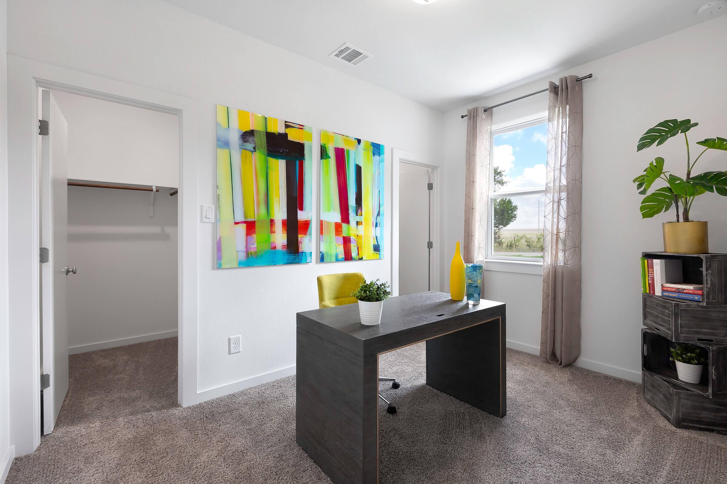 a living room with a sink and a window