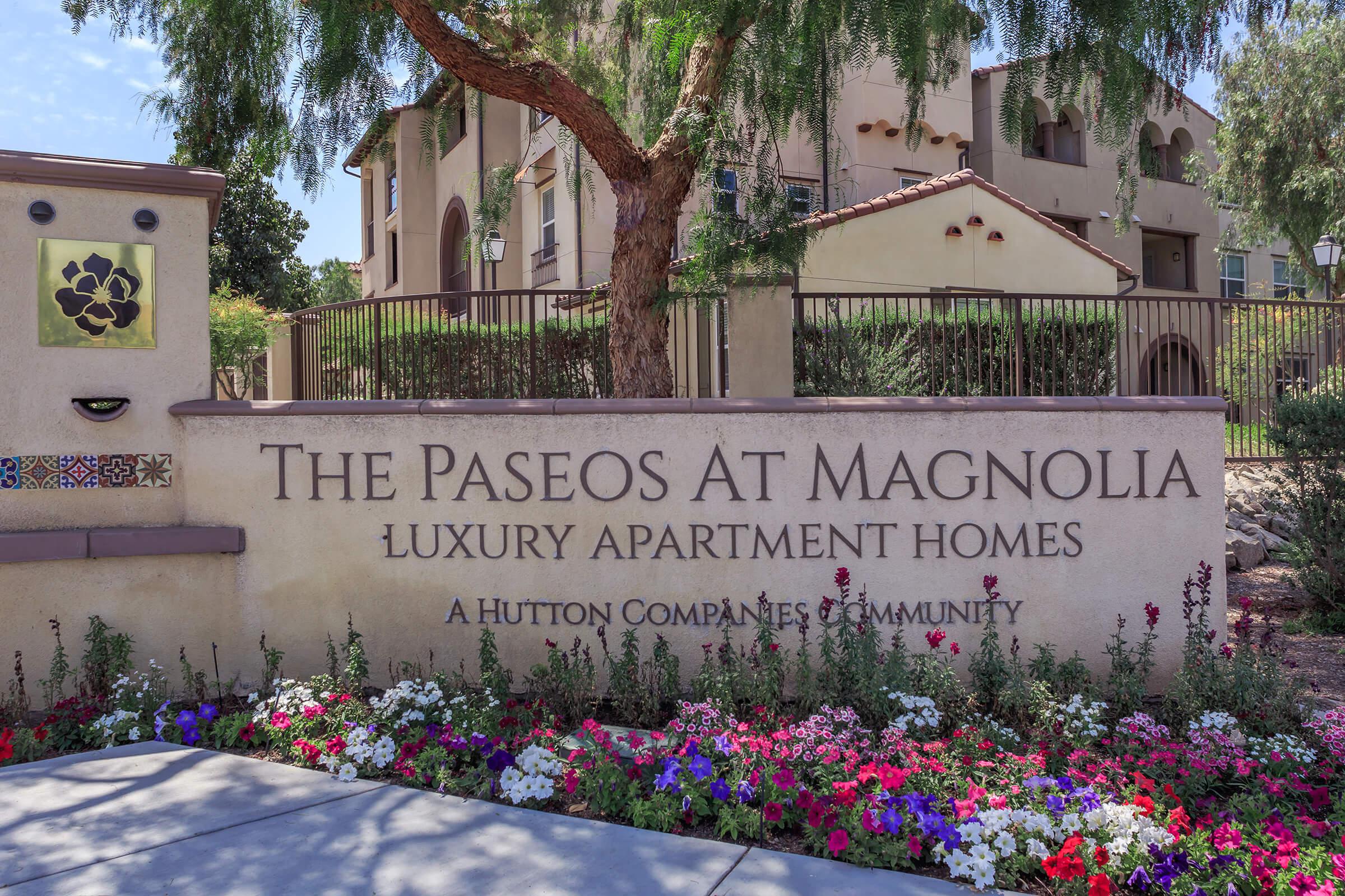The Paseos at Magnolia Luxury Apartment Homes monument sign
