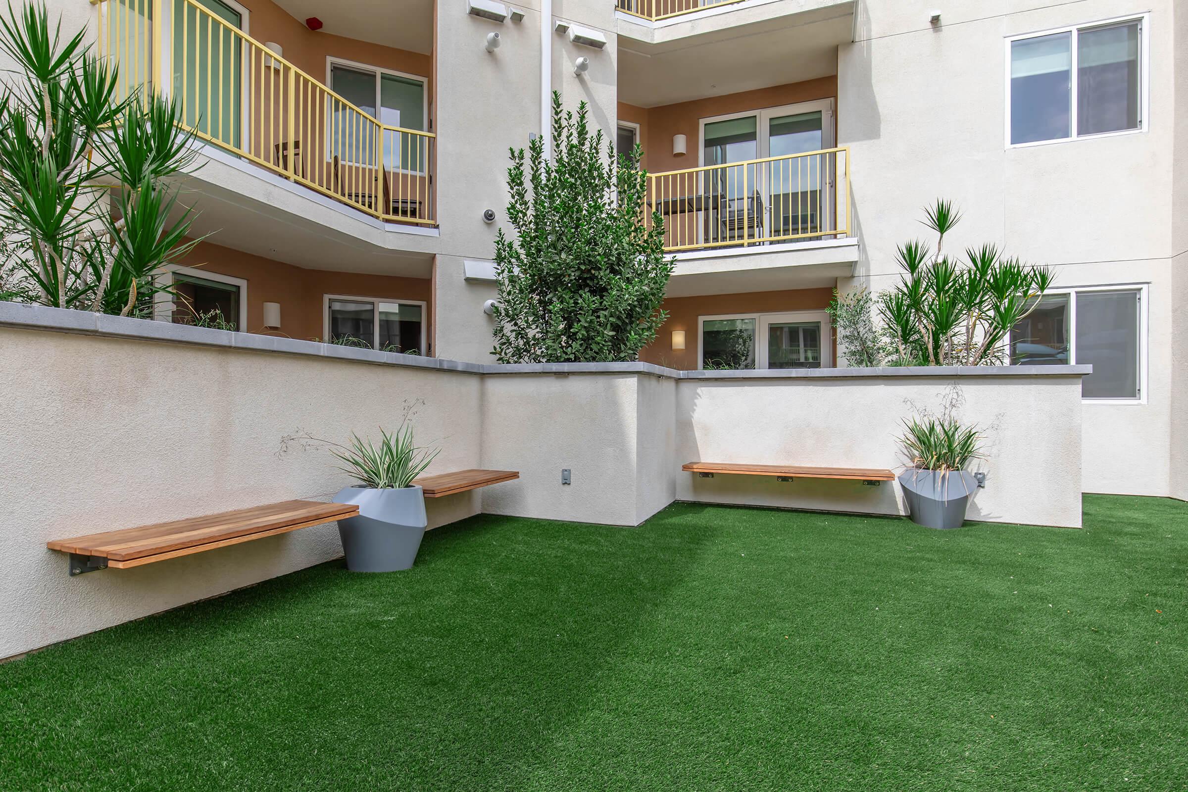 a large lawn in front of a house