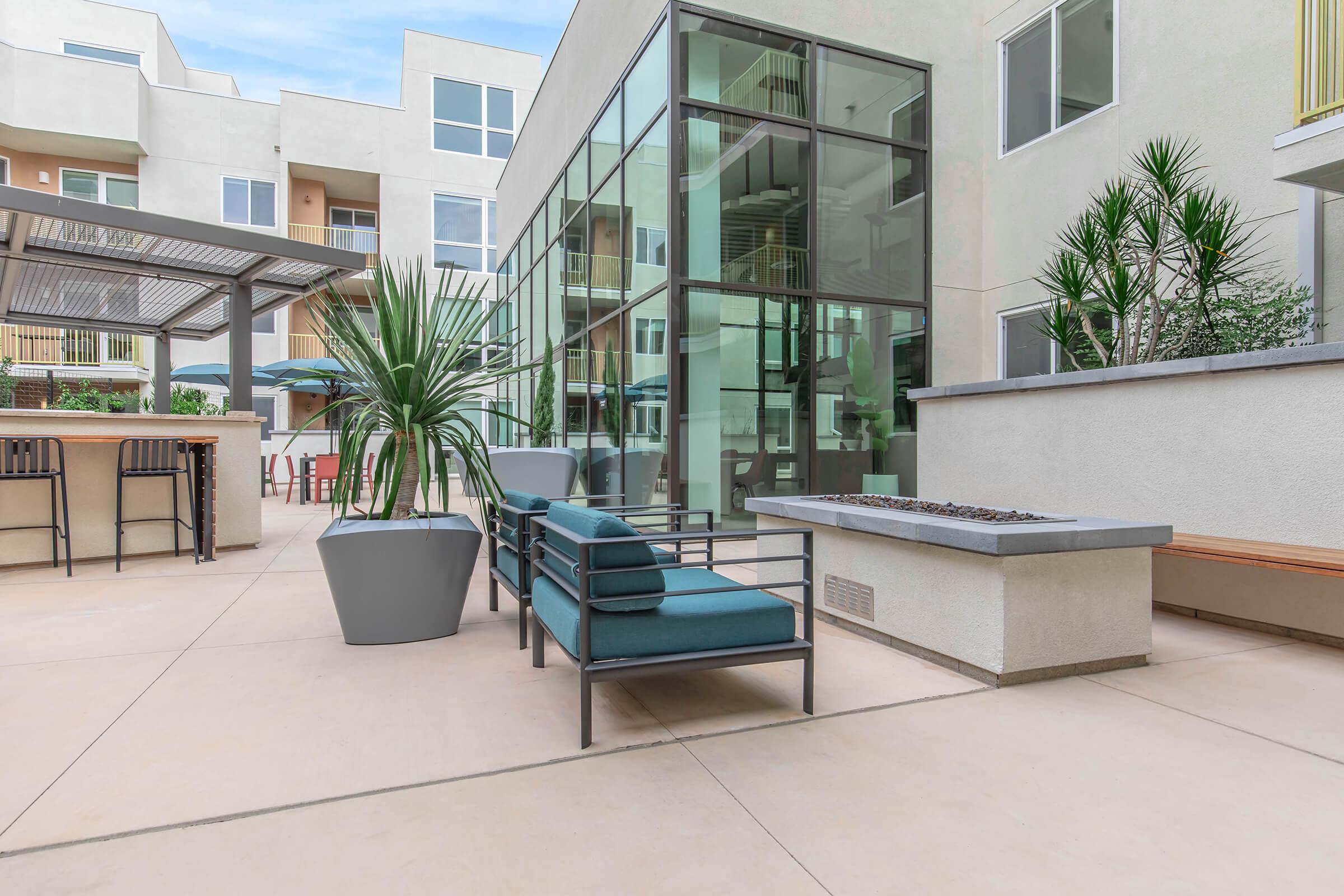 a chair sitting in front of a building