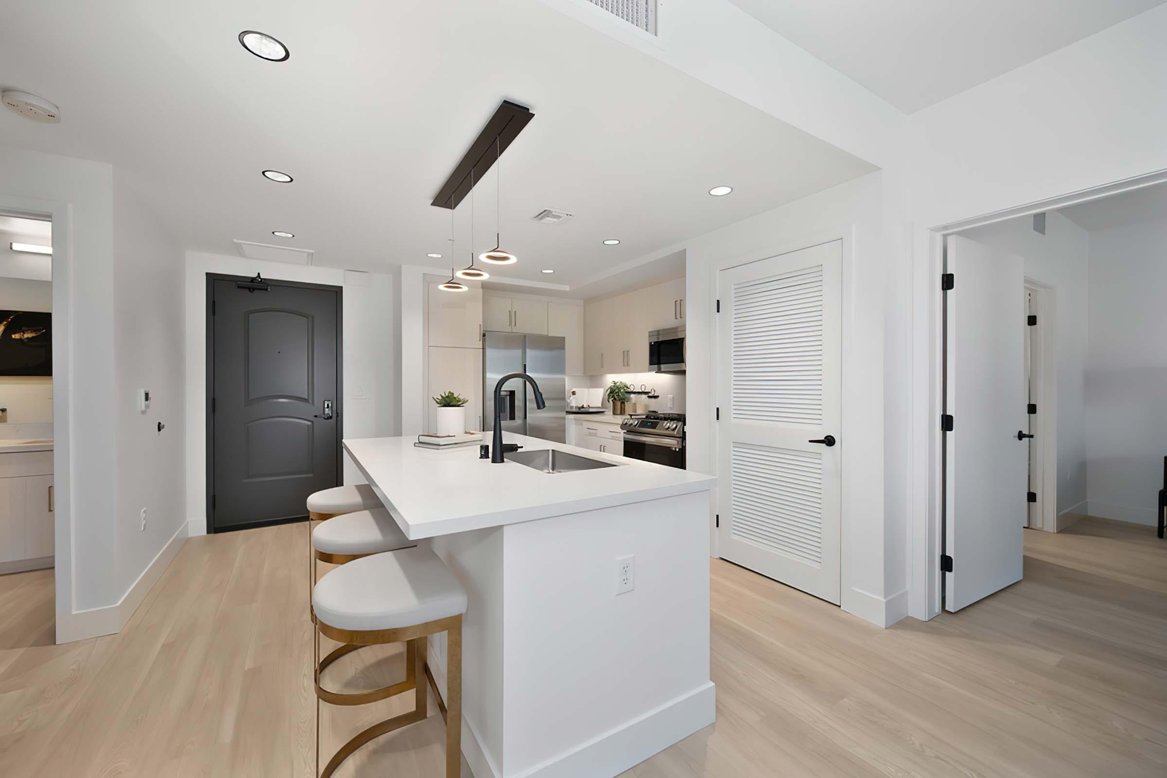 a kitchen with a wood floor