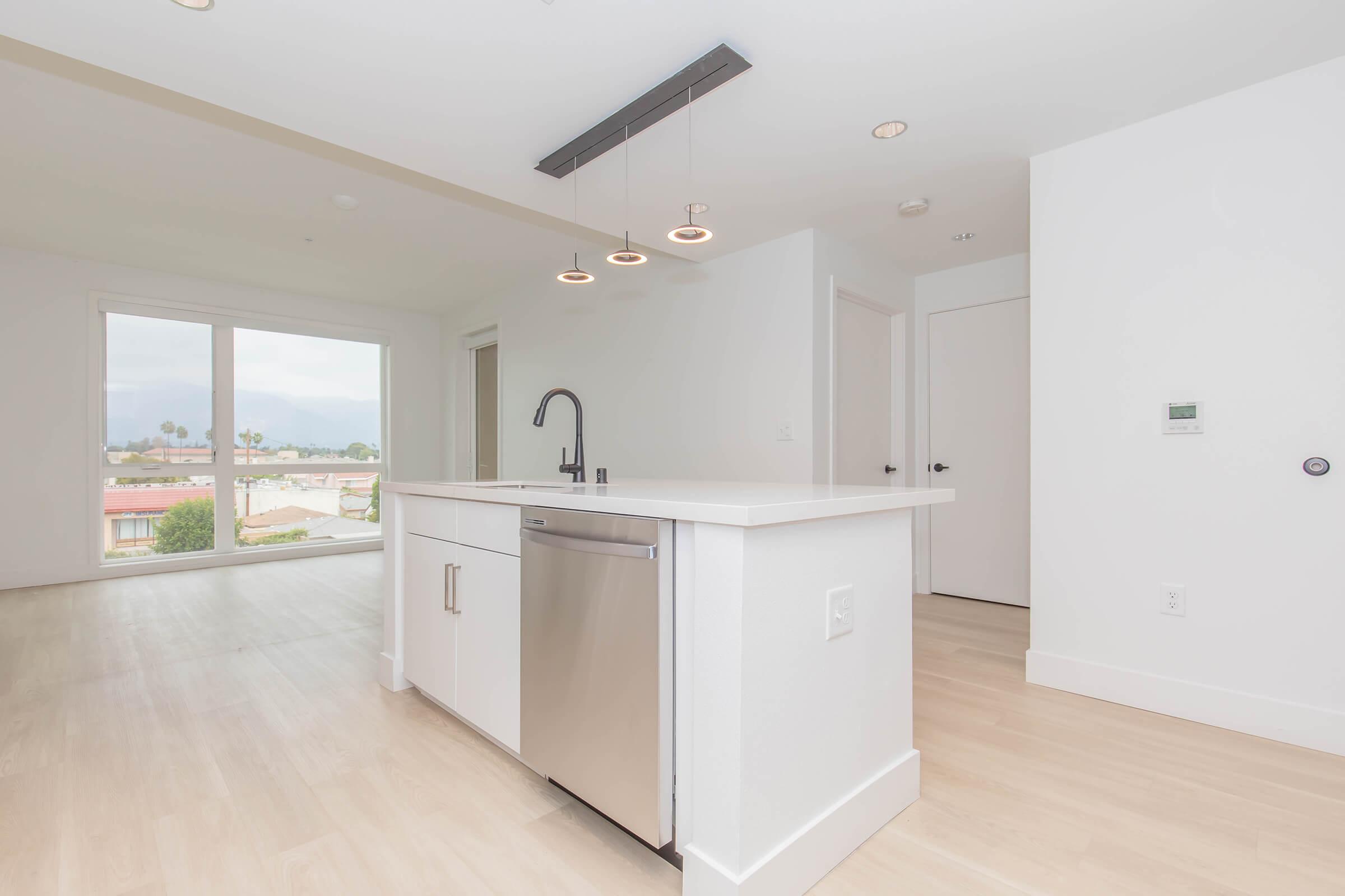 a kitchen with a wood floor