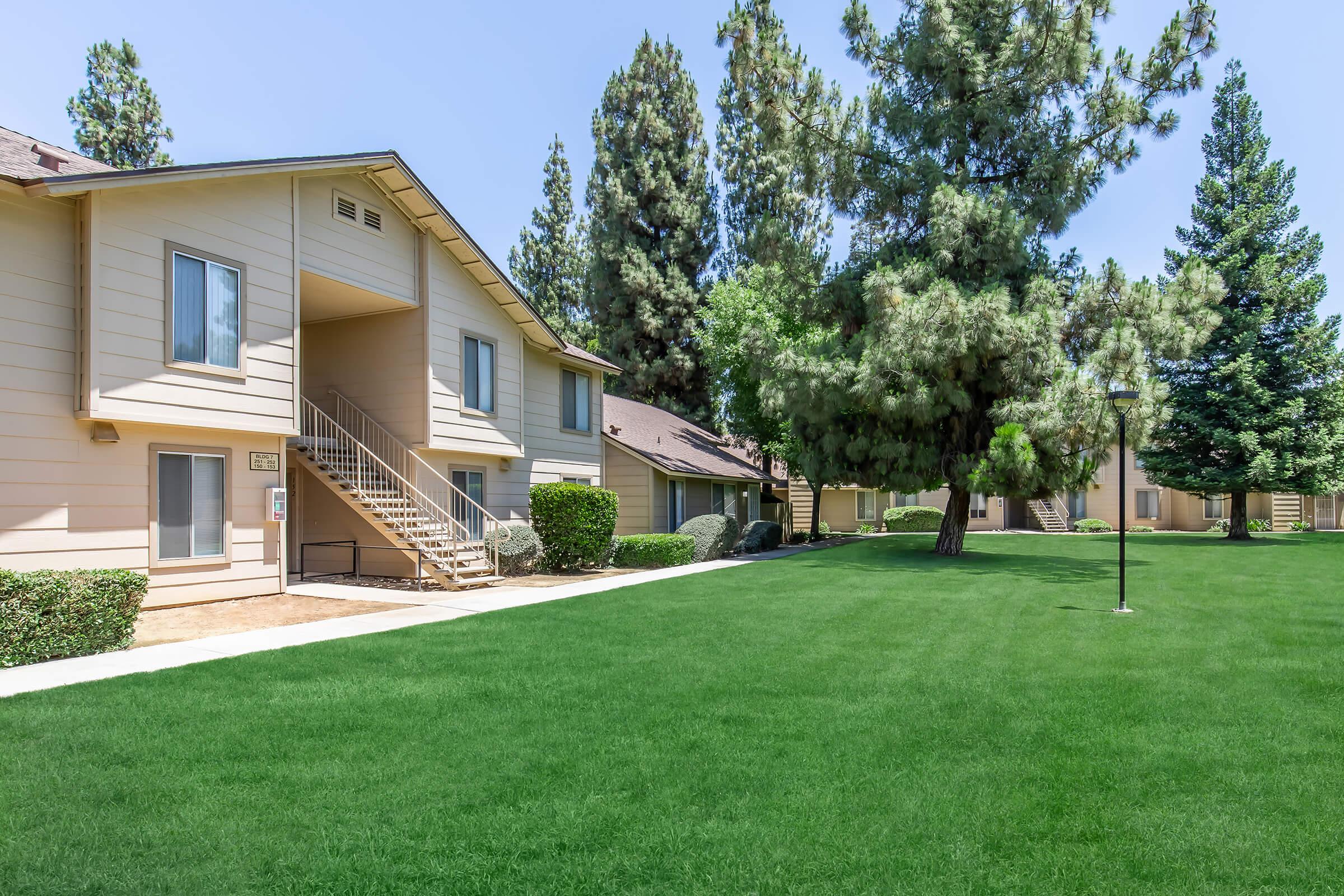 a large lawn in front of a house