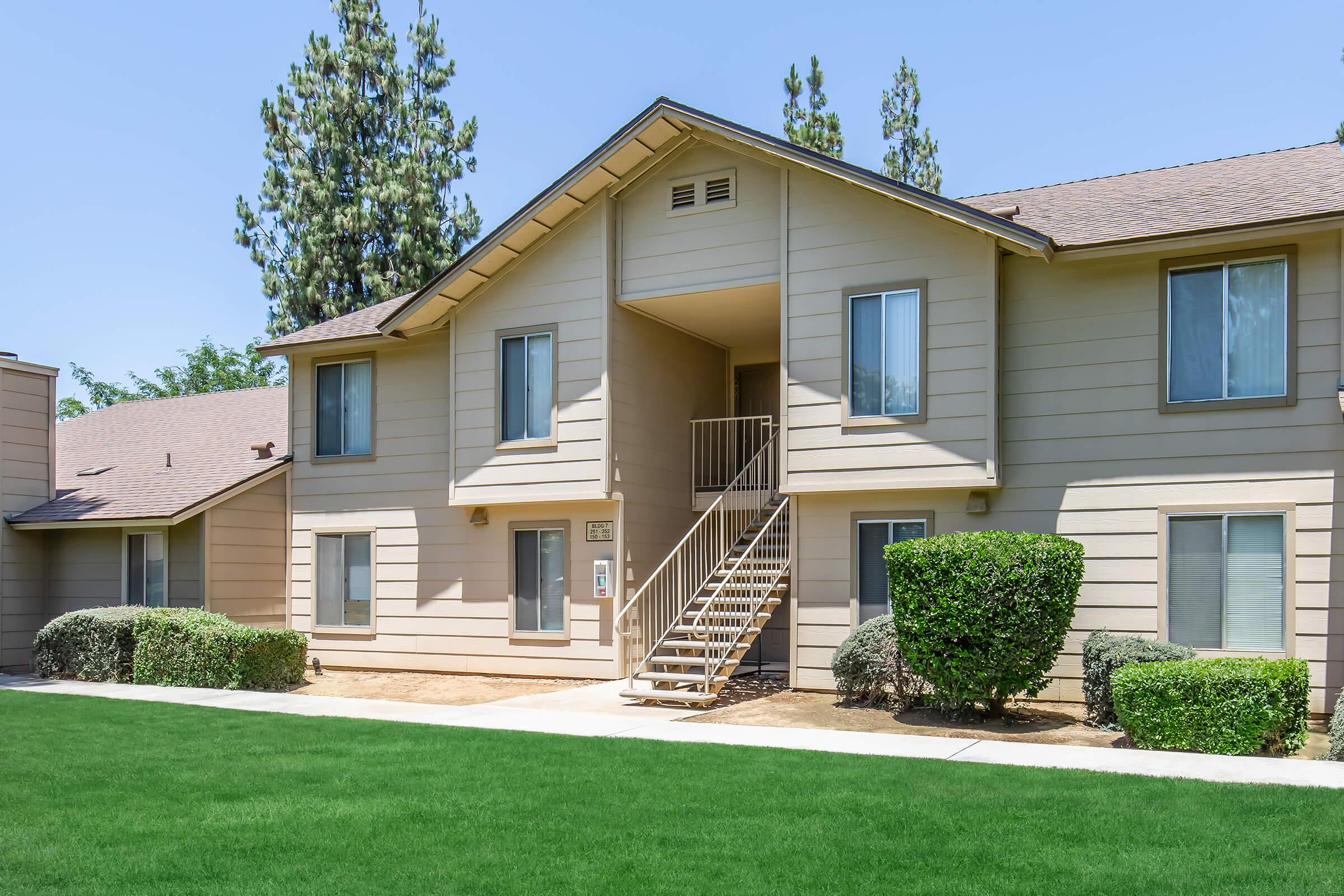 a large lawn in front of a house