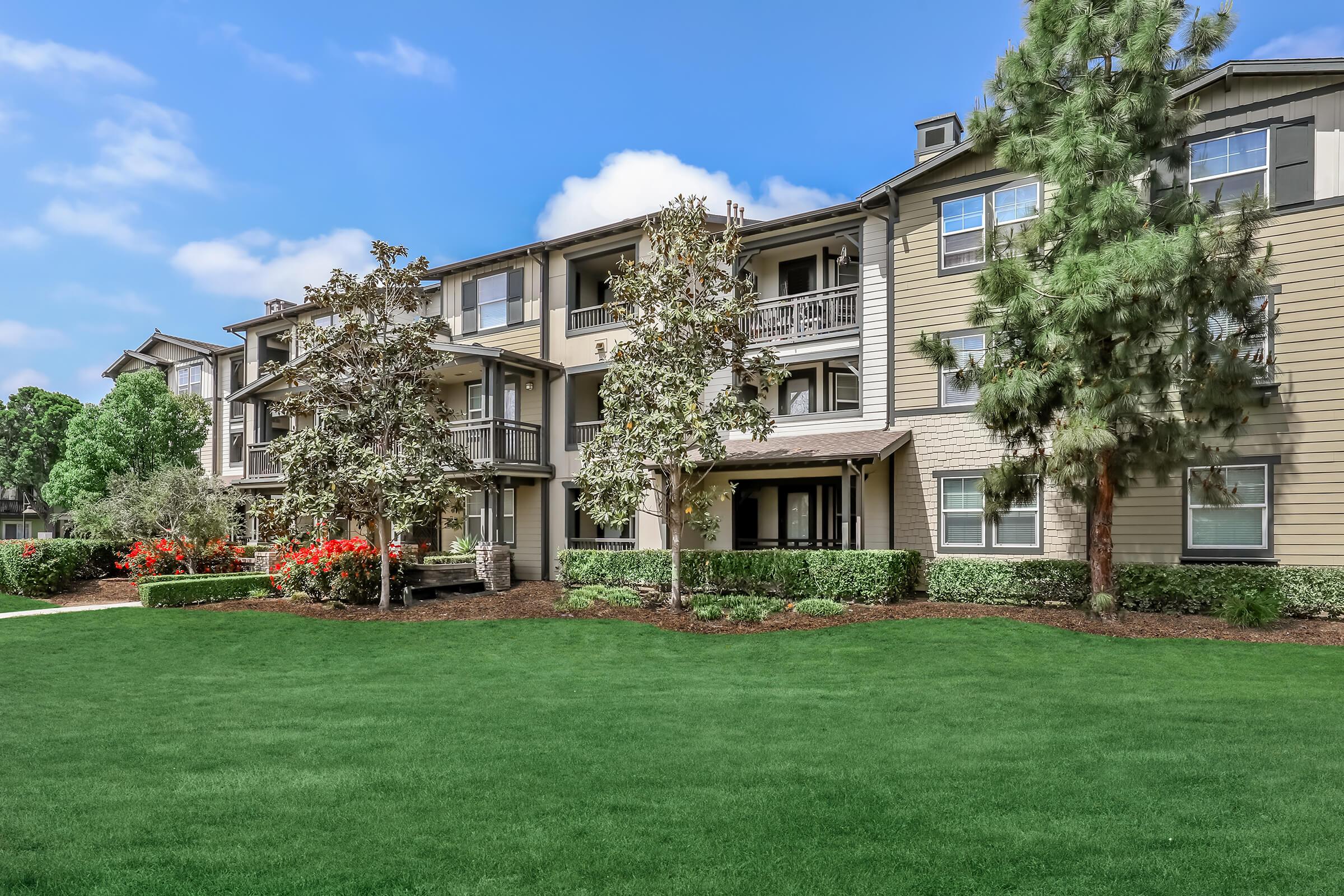 a large lawn in front of a house