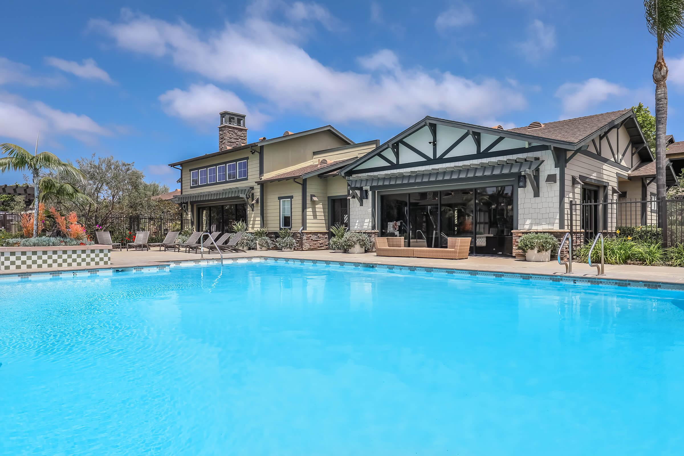 a house with a large pool of water