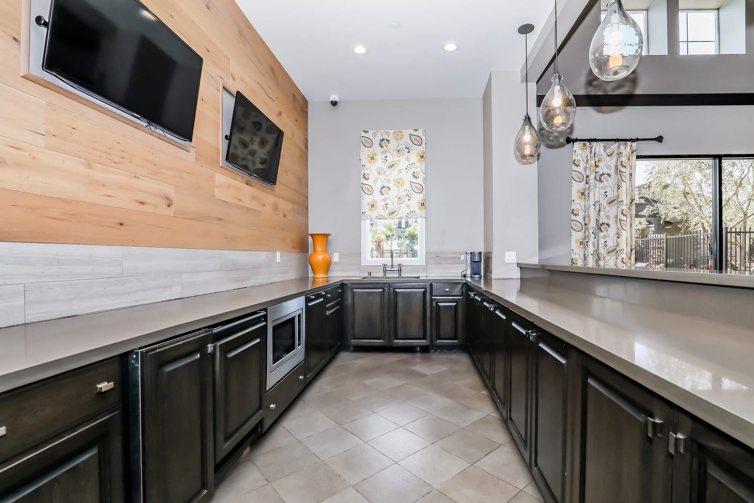 a kitchen with a large window