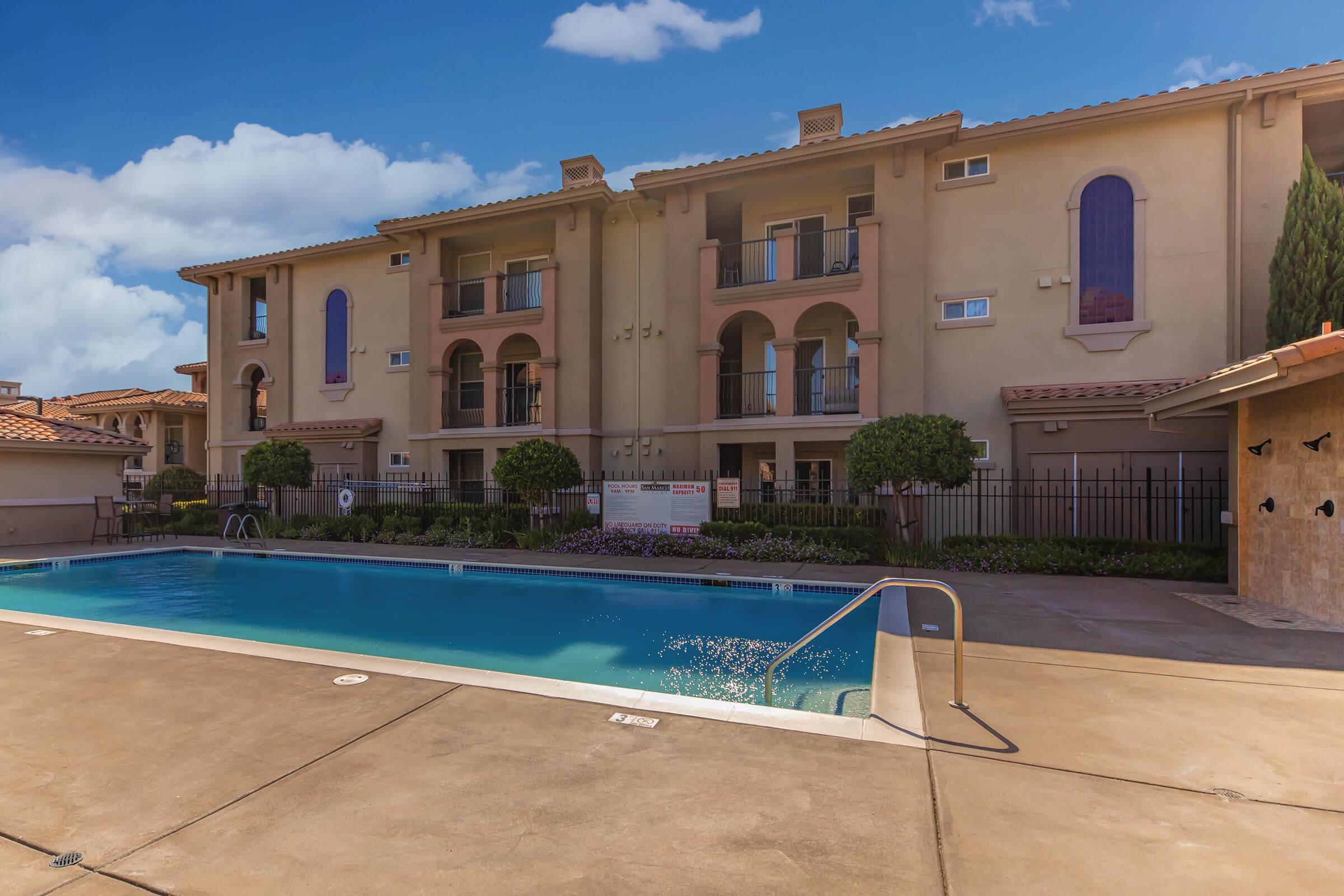 a pool next to a building