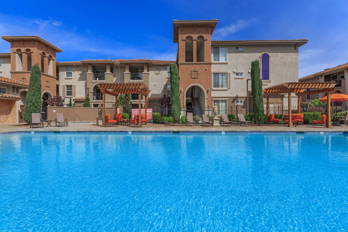 a large pool of water in front of a building