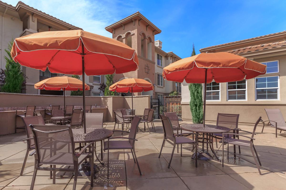 a group of lawn chairs sitting on top of a table