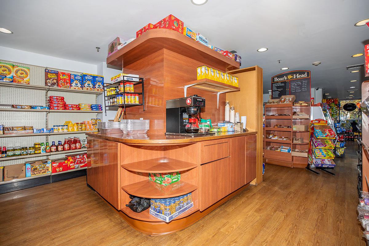 a room filled with furniture and a refrigerator