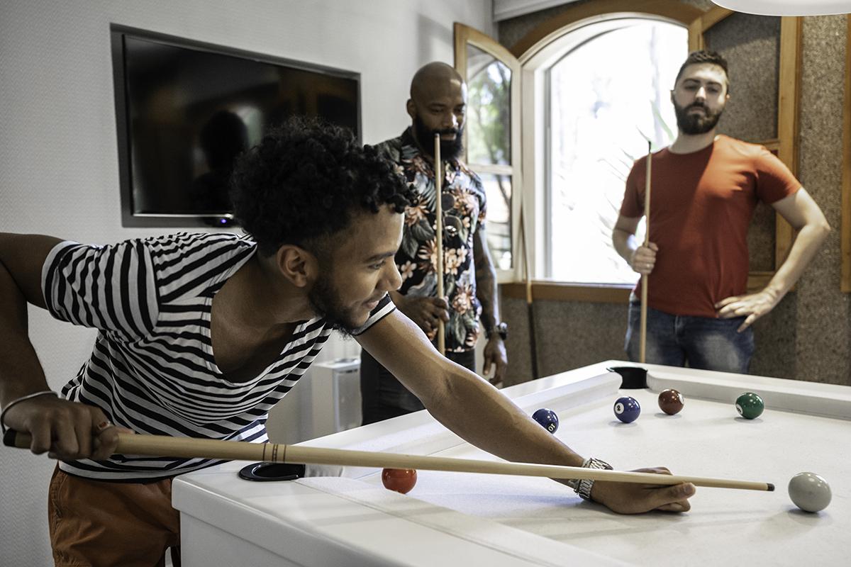 Friends playing pool.jpg