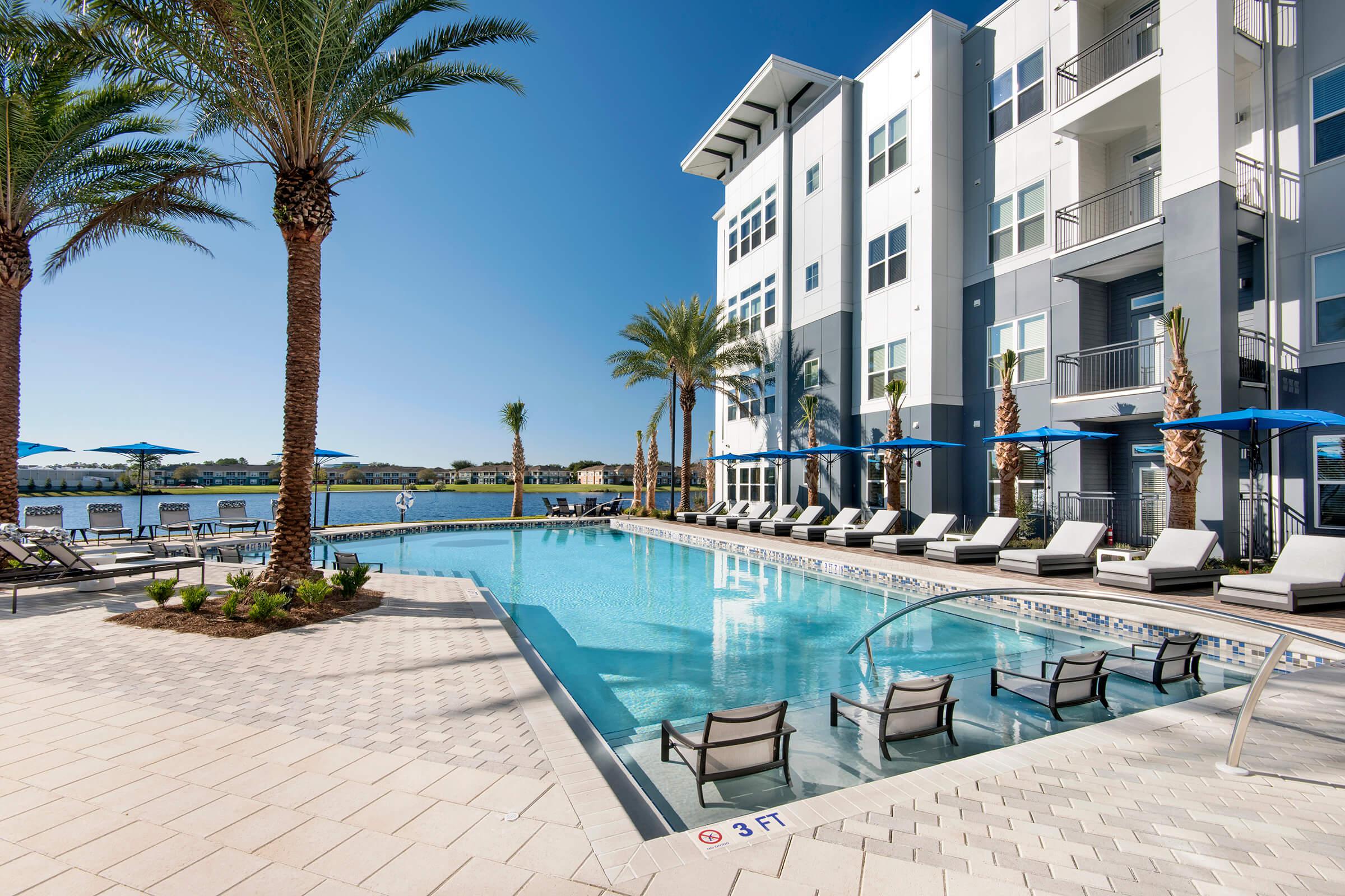 a pool next to a building