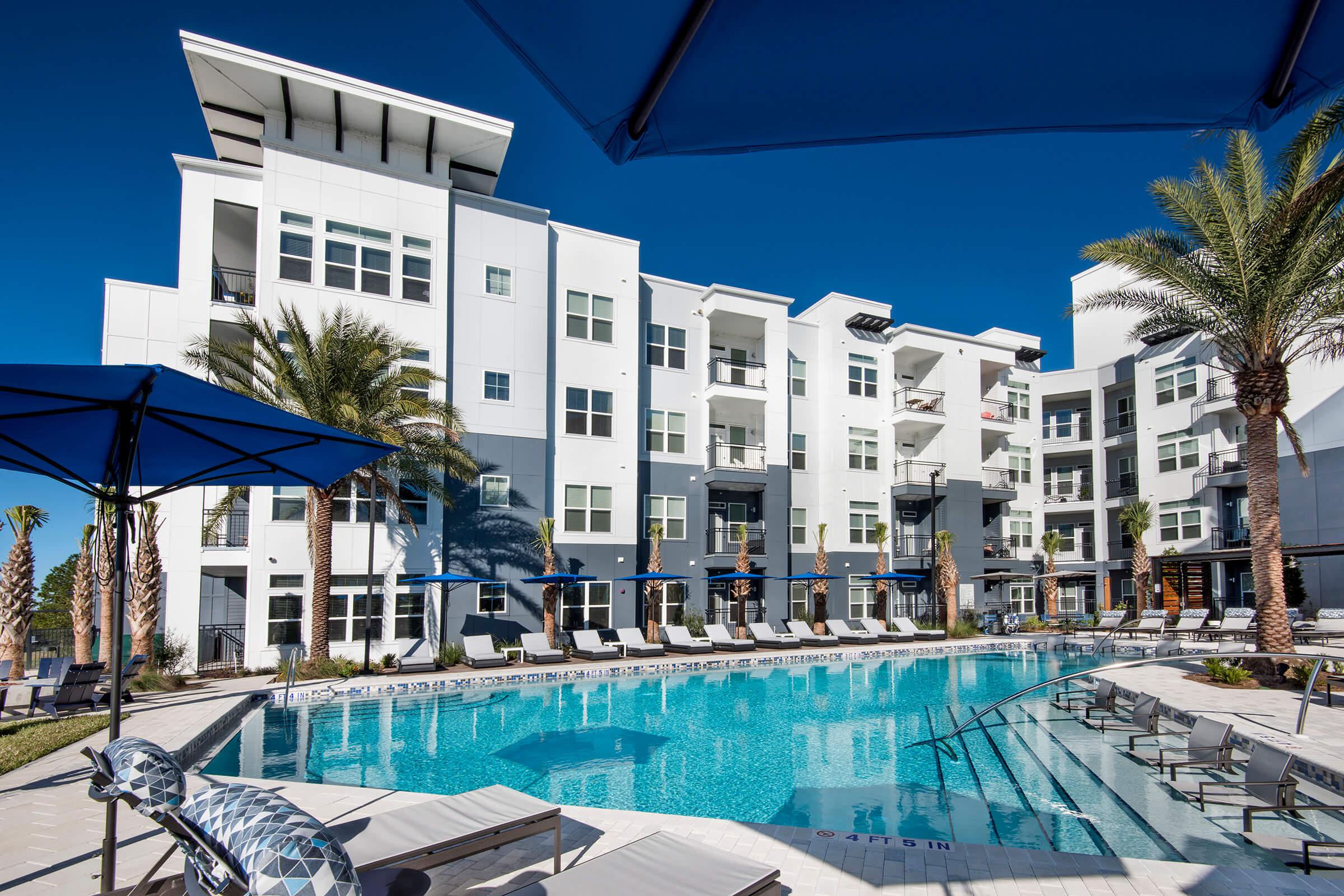 a pool next to a building