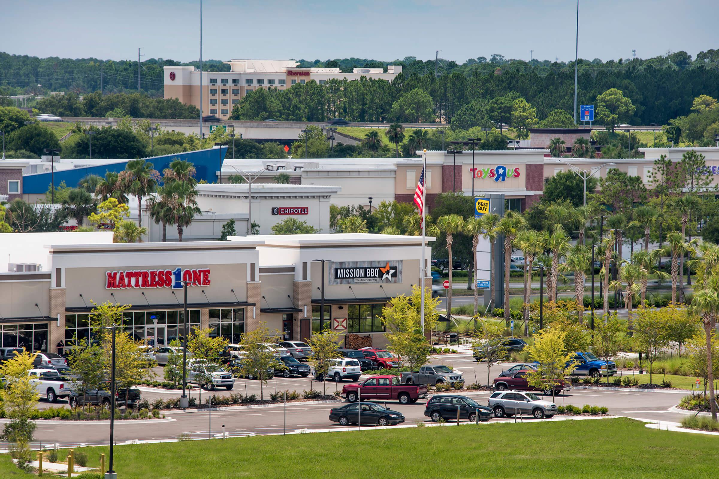 a group of people in a parking lot