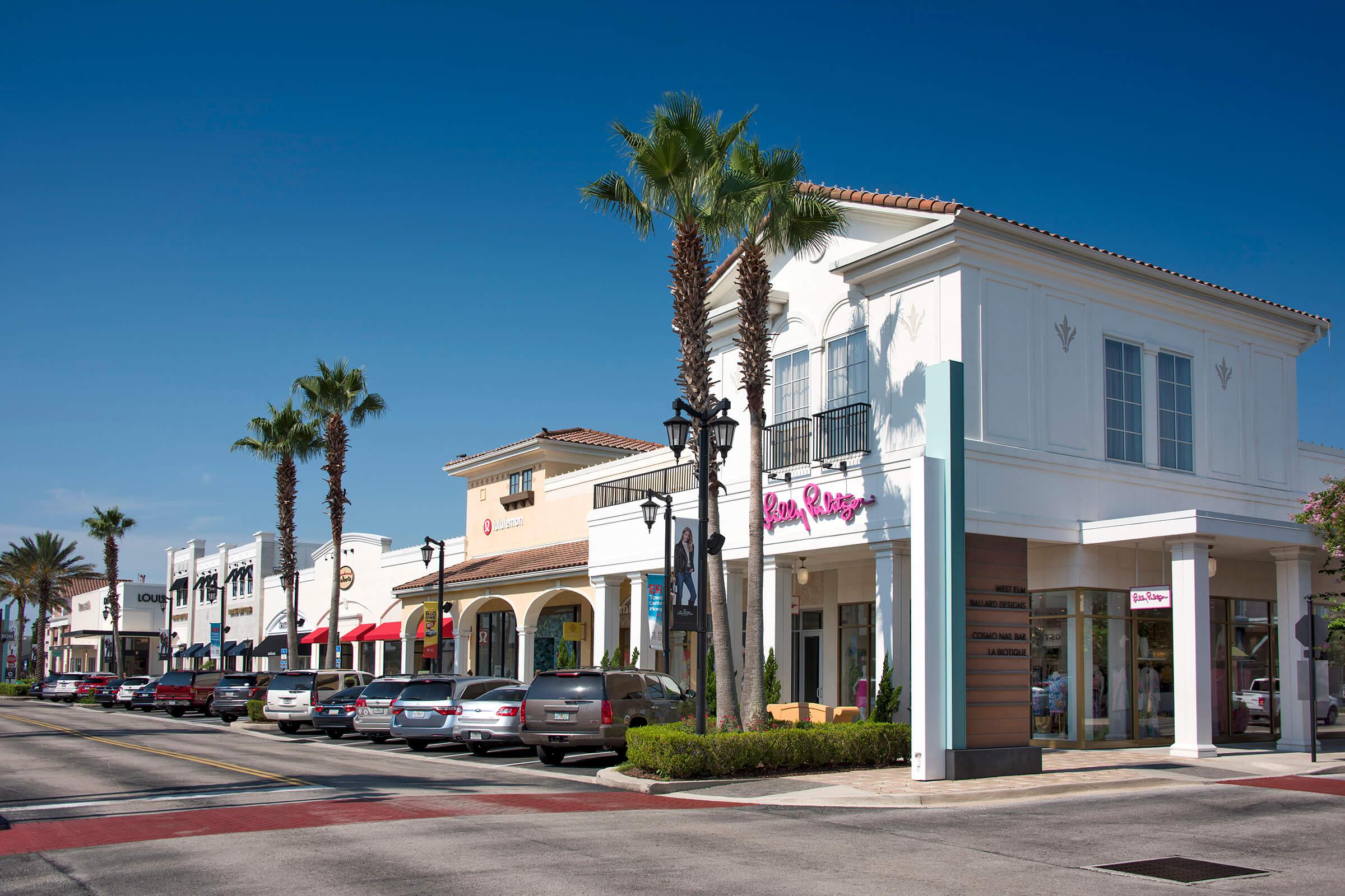 a building with a store on the side of a road