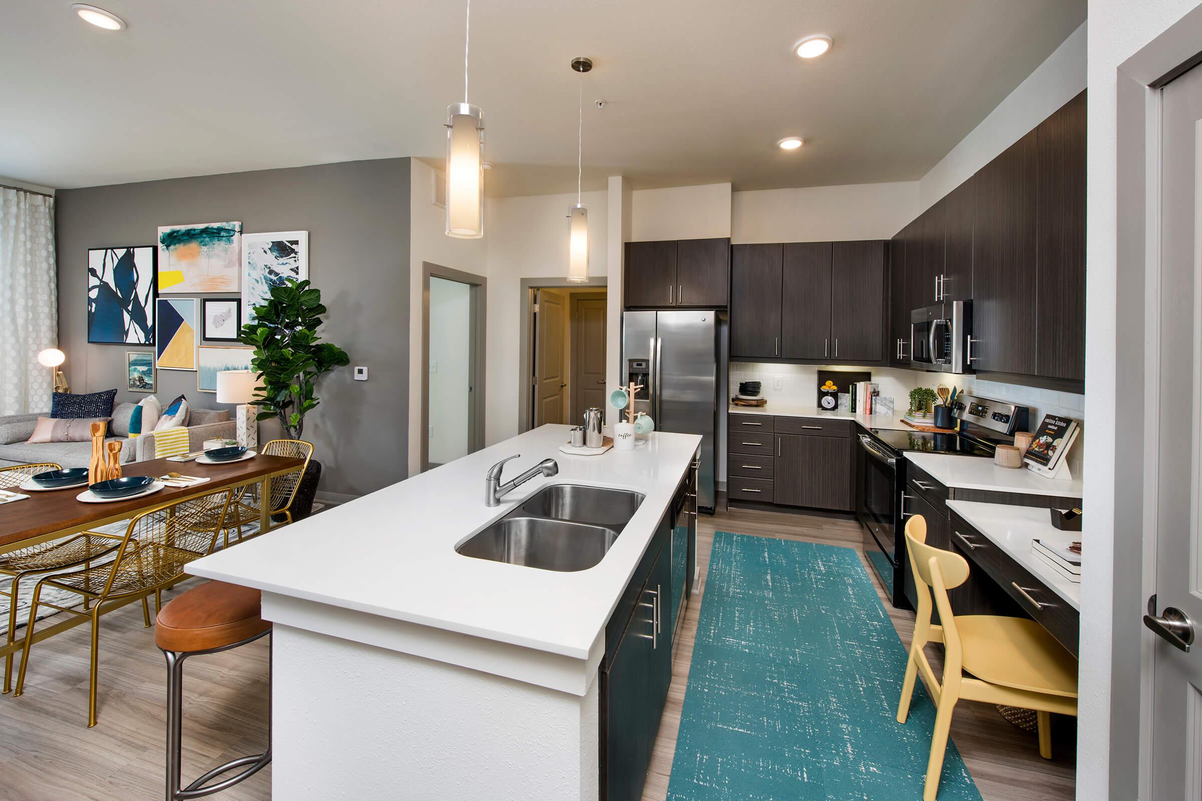 a modern kitchen with stainless steel appliances