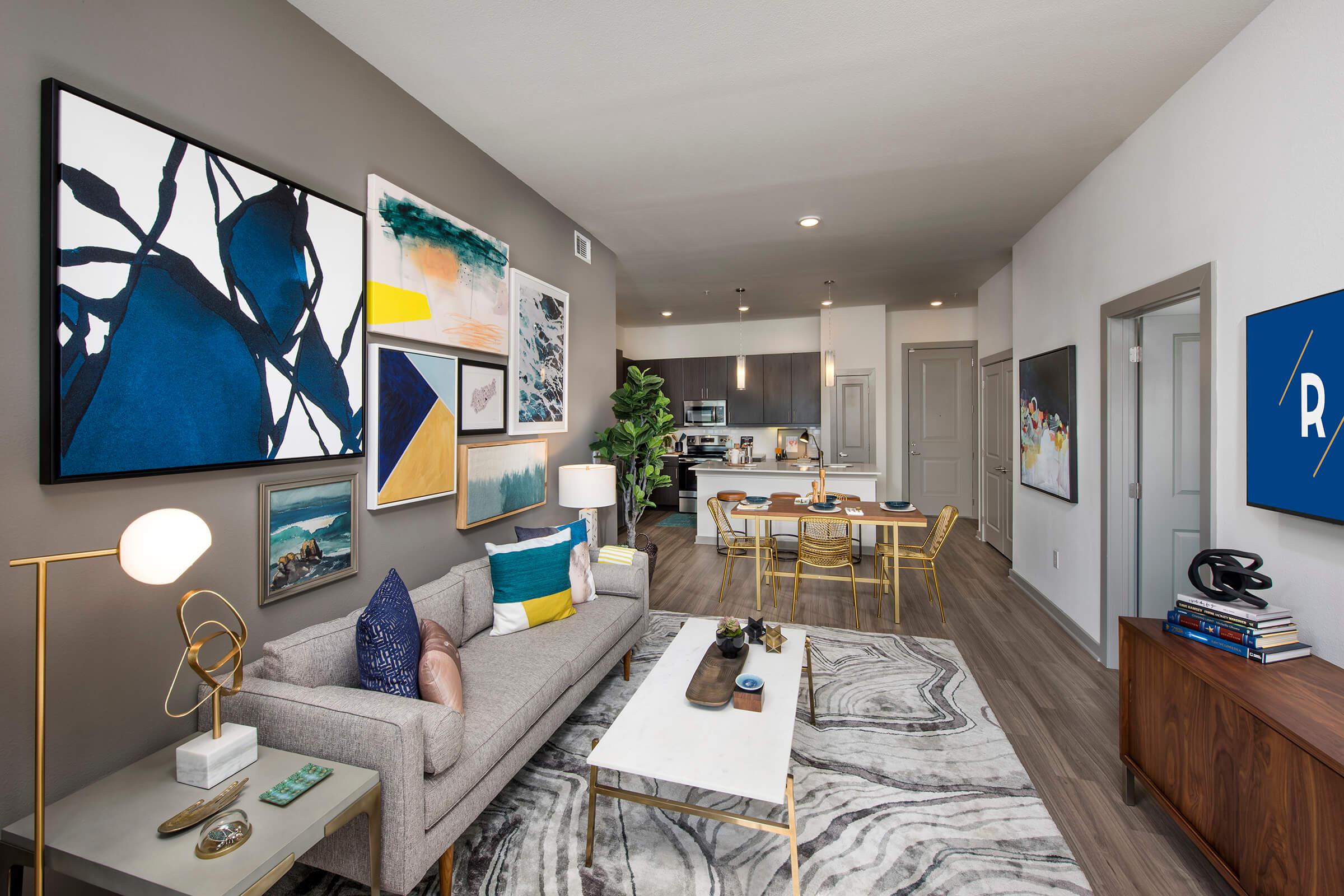 a room filled with furniture and a flat screen tv