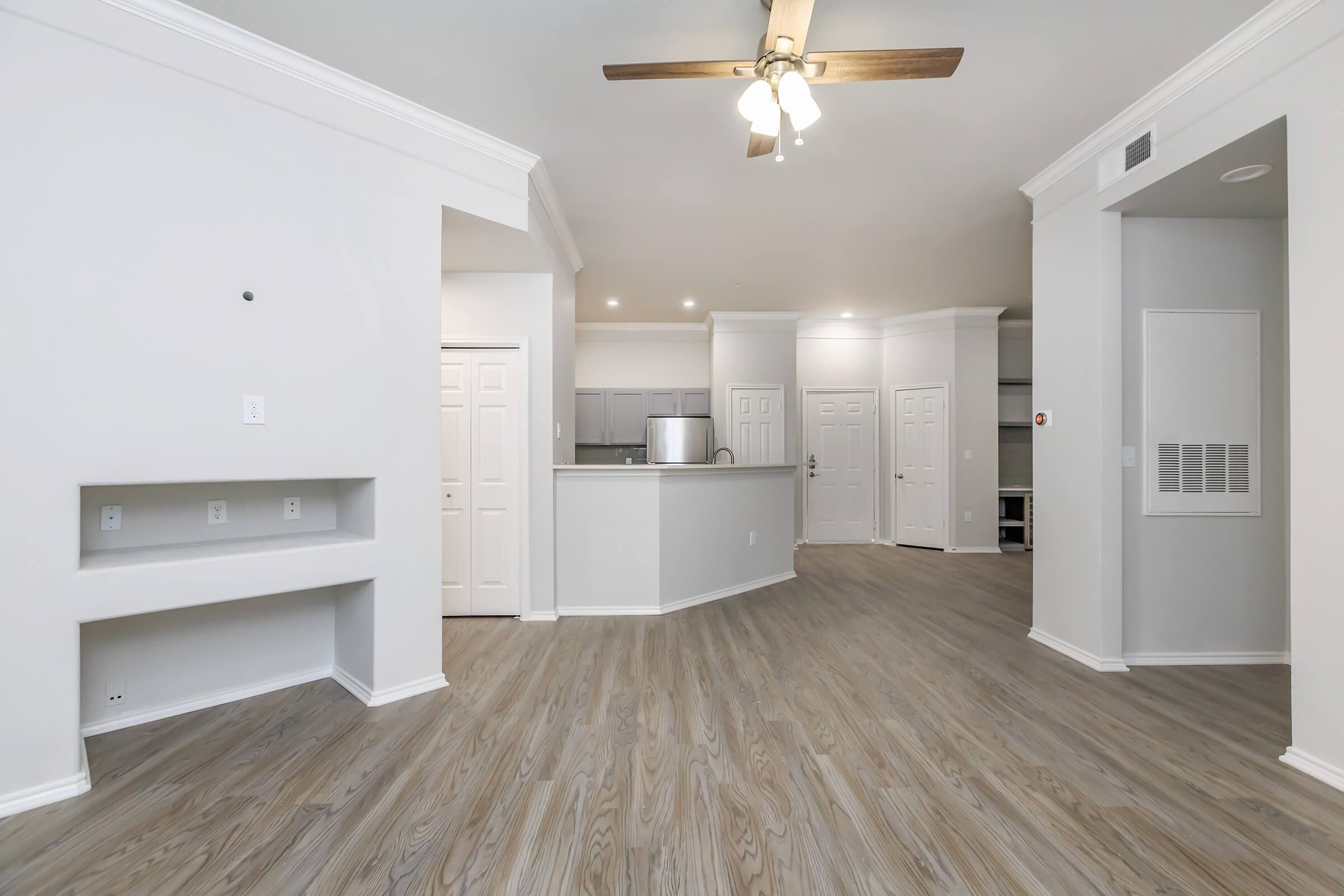 a large white refrigerator in a kitchen