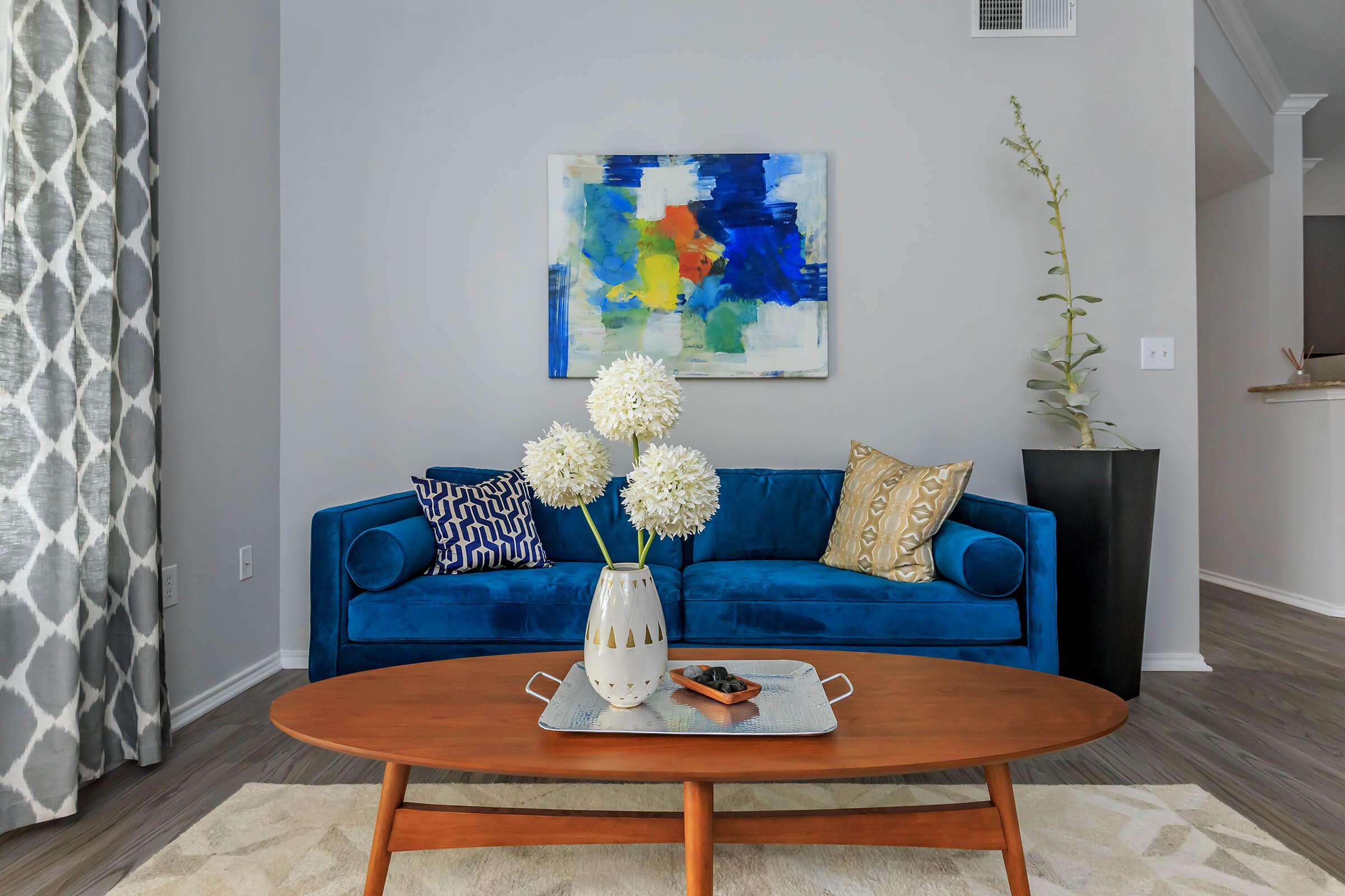 a room with a couch and a table