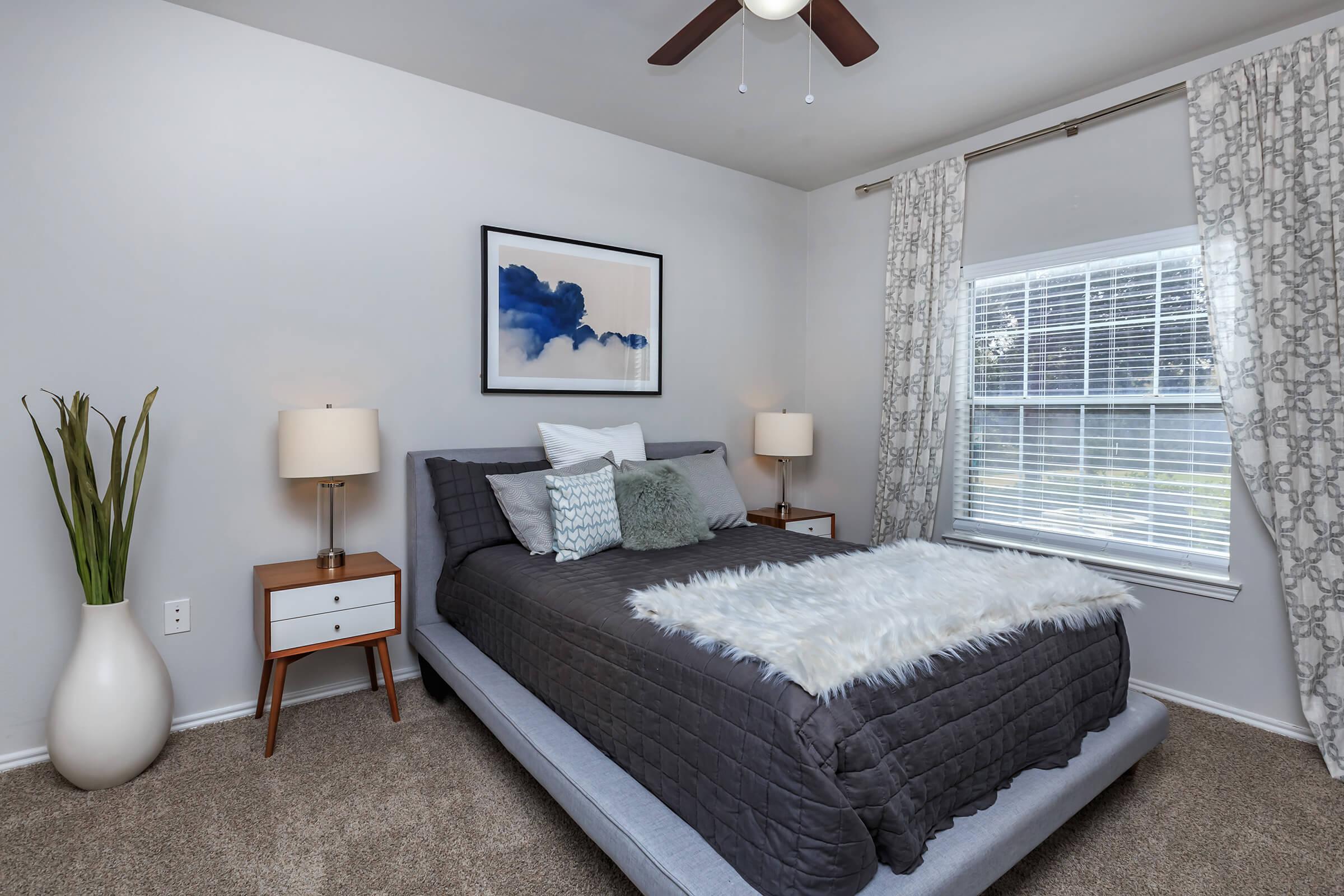 a bedroom with a bed in a hotel room