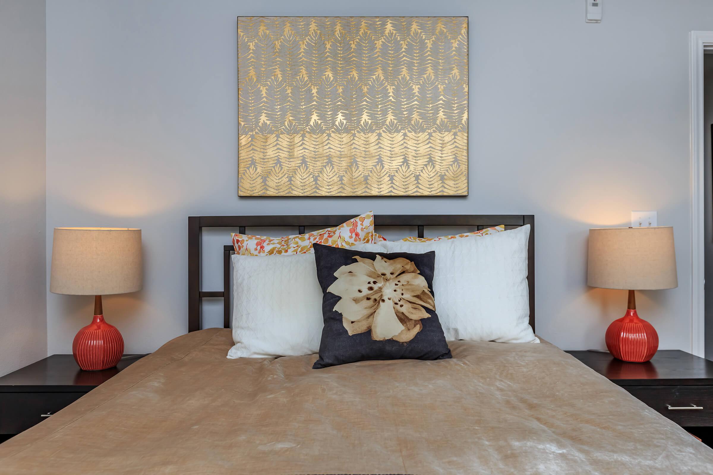 a bedroom with a bed in a hotel room