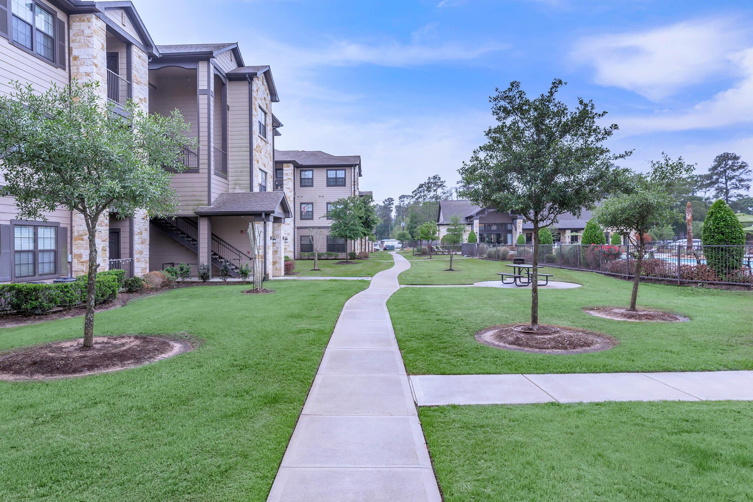 a large lawn in front of a house