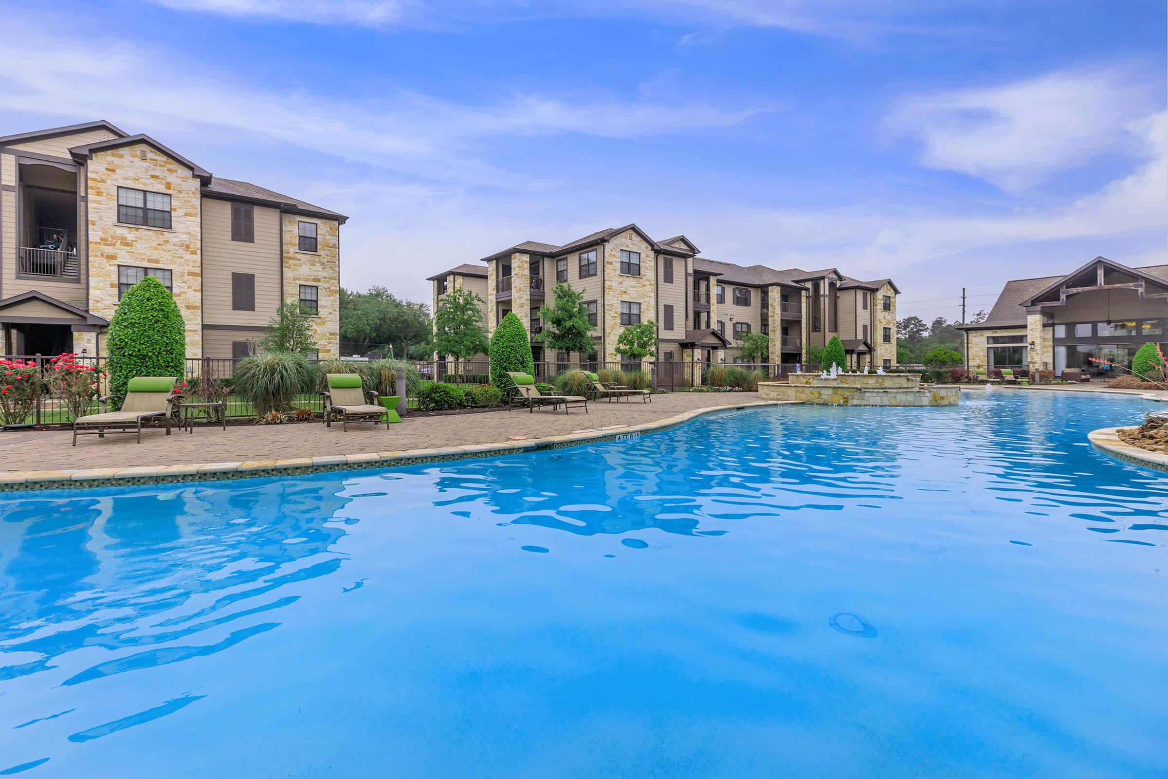 a house with a large pool of water